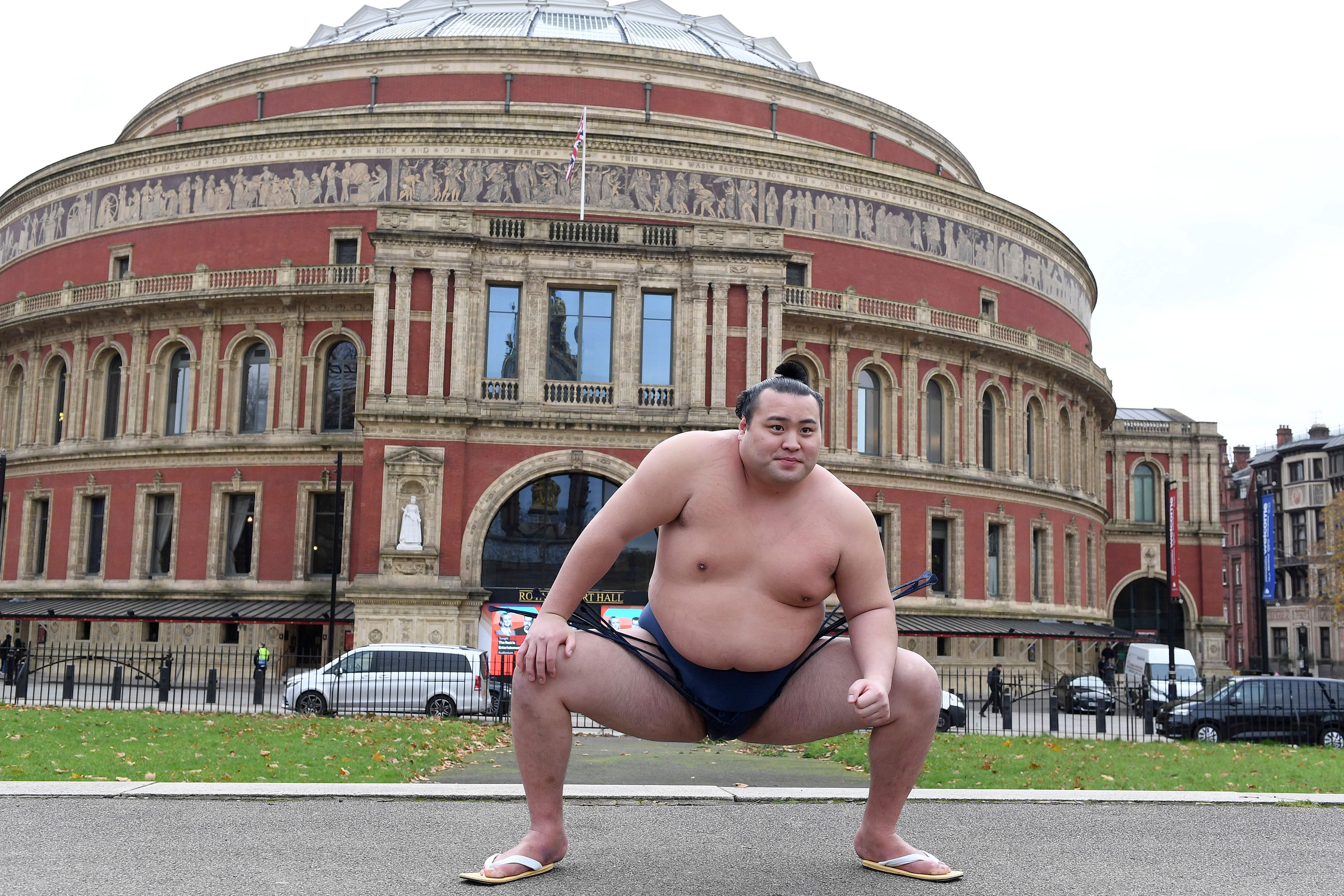 Rishiki from Japan's Sumo Kyokai, Daisuke Kitanowaka poses for a photo call outside of London's Royal Albert Hall in London, Wednesday, Dec. 4, 2024 where the UK's second ever official basho will take place in October of next year. (AP Photo/Thomas Krych)