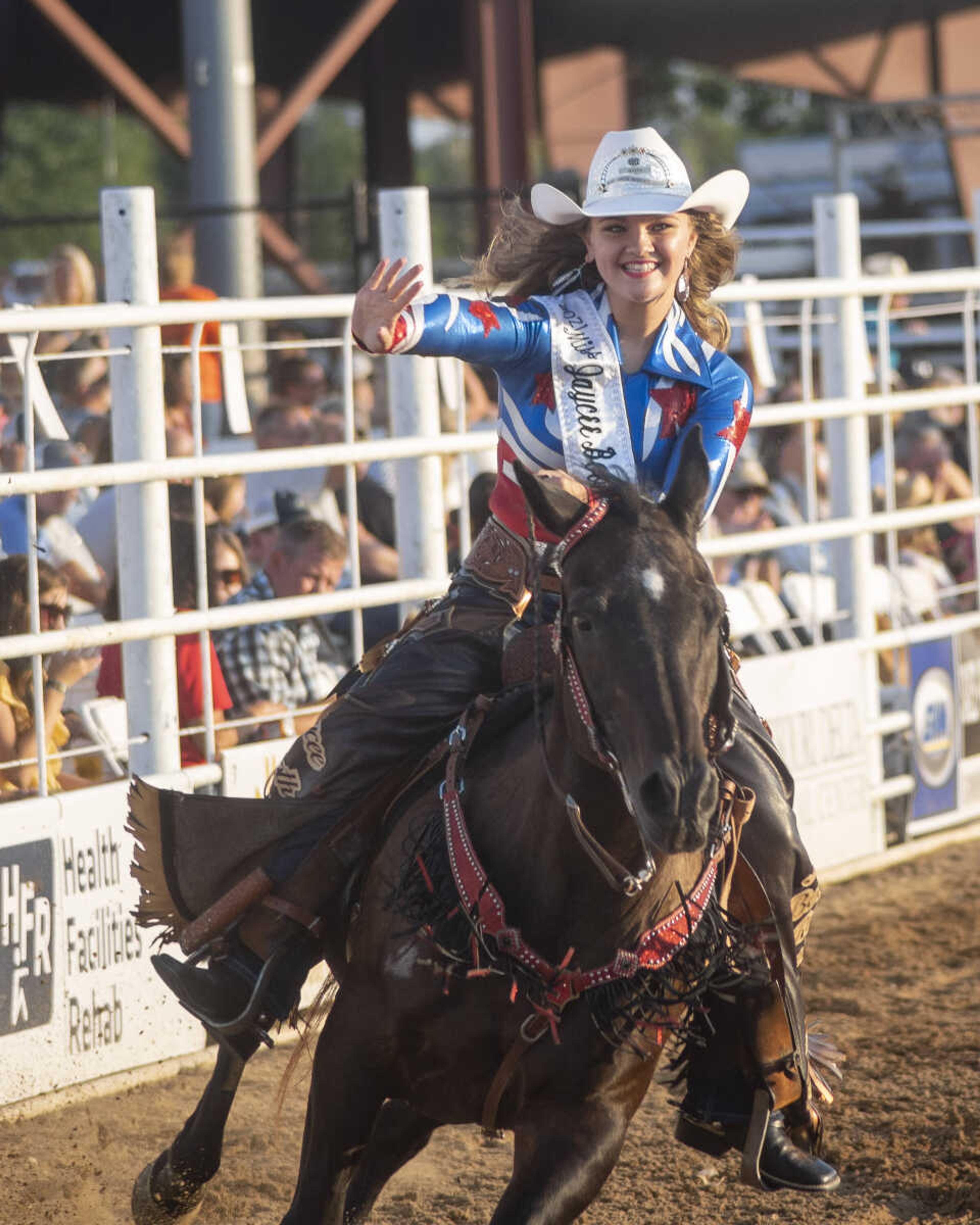 A rider performs during the first night of the Sikeston Jaycee Bootheel Rodeo on Wednesday, Aug. 11, 2021, in Sikeston, Missouri.