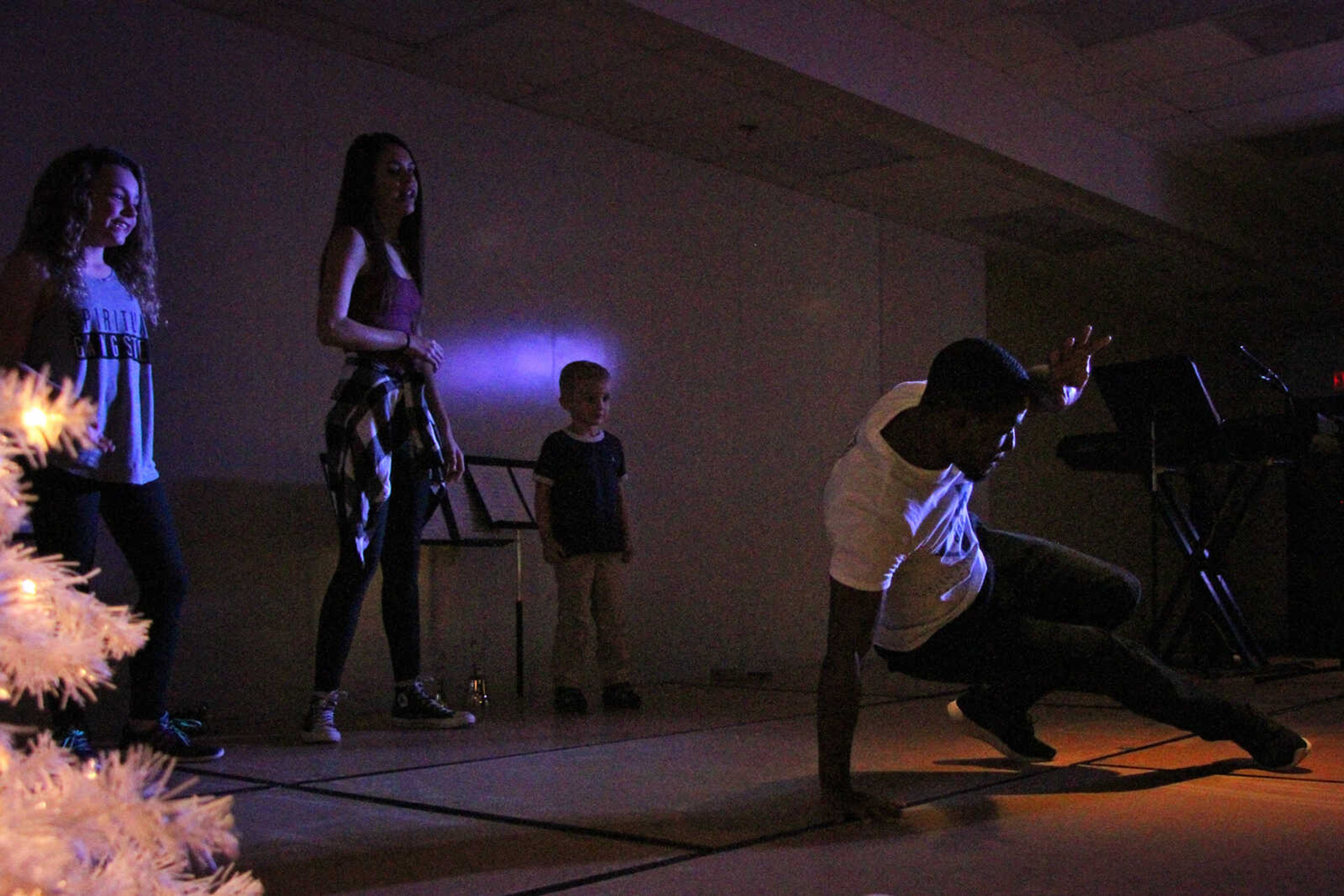 Jimmie Miller breakdances as a part of his performance with Broken and Redeemed Dance Studio.