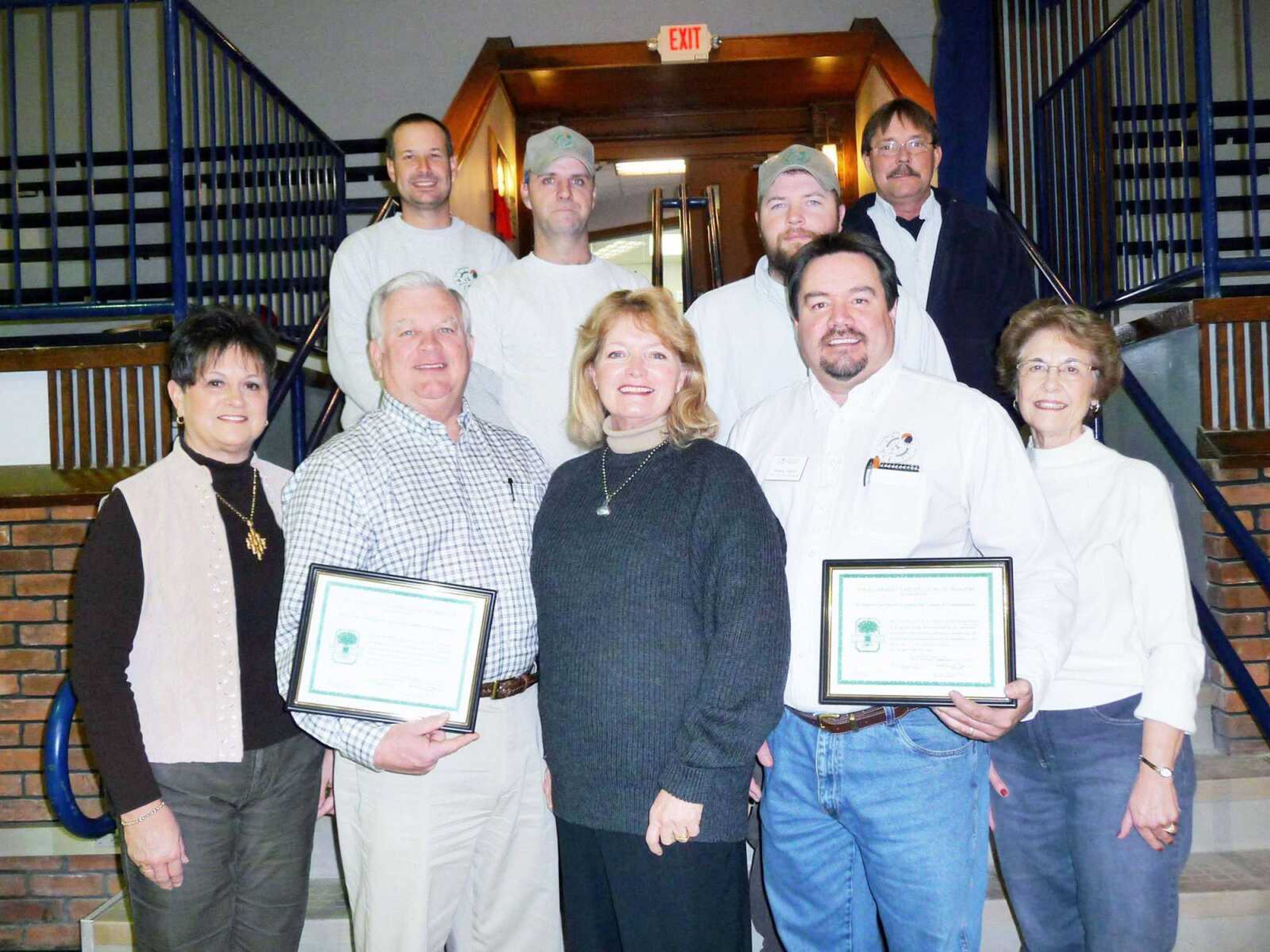 The Ramblewood Garden Club and the Cape Girardeau Council of Garden Clubs presented Citation of Commendation to Dan Muser, director of Cape Girardeau Parks and Recreation; Brock Davis, parks manager; and the employees of the Parks and Recreation Department. The citation recognizes the help Muser, Davis and the park employees have given to maintain the Capaha Park Rose Garden, the adjoining Butterfly Garden and Azalea Garden. (Submitted photo)