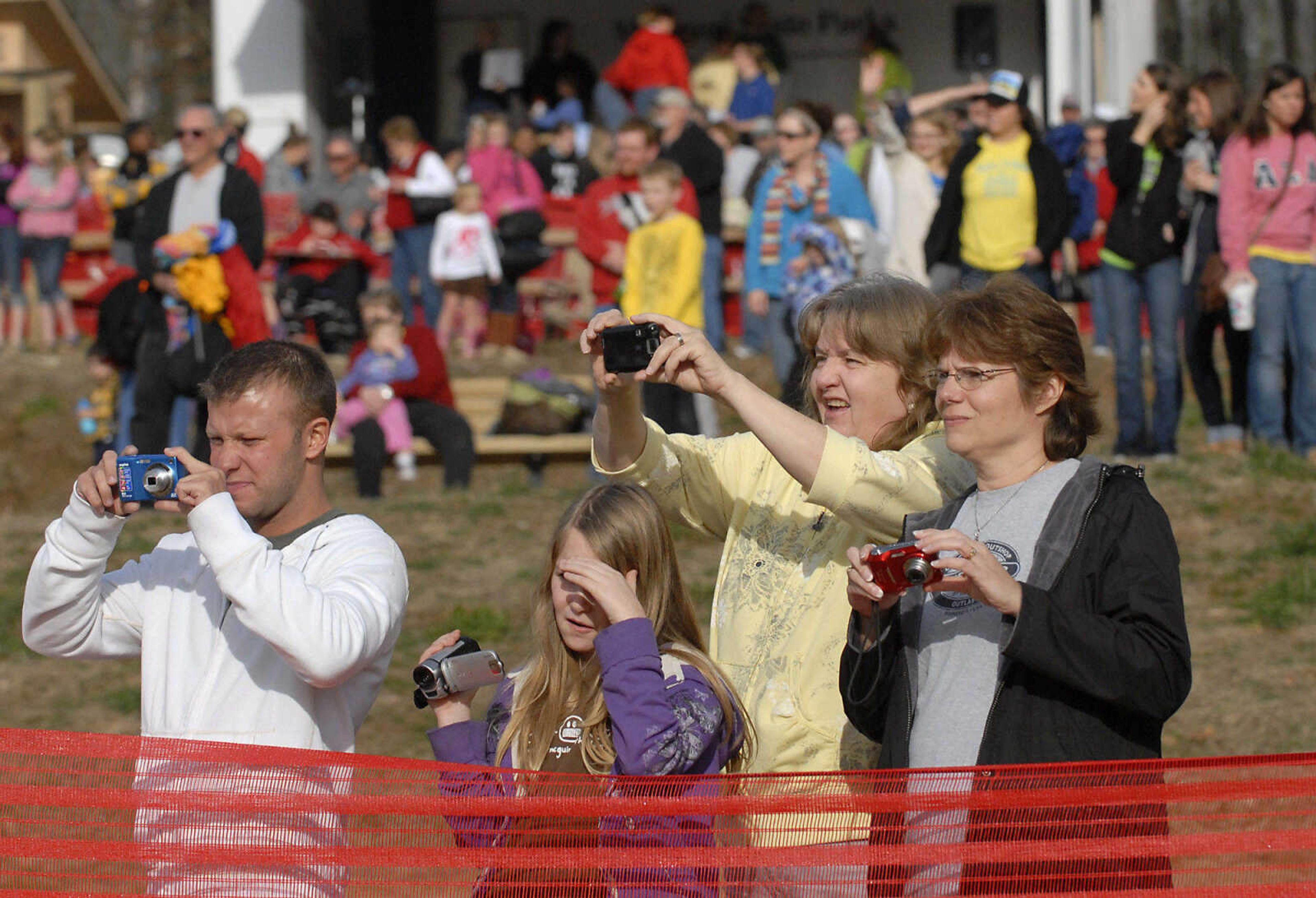 KRISTIN EBERTS ~ keberts@semissourian.com

Spectators watch from dry ground as teams brave the water during the 2012 Polar Plunge at the Trail of Tears State Park's Lake Boutin on Saturday, Feb. 4, 2012.