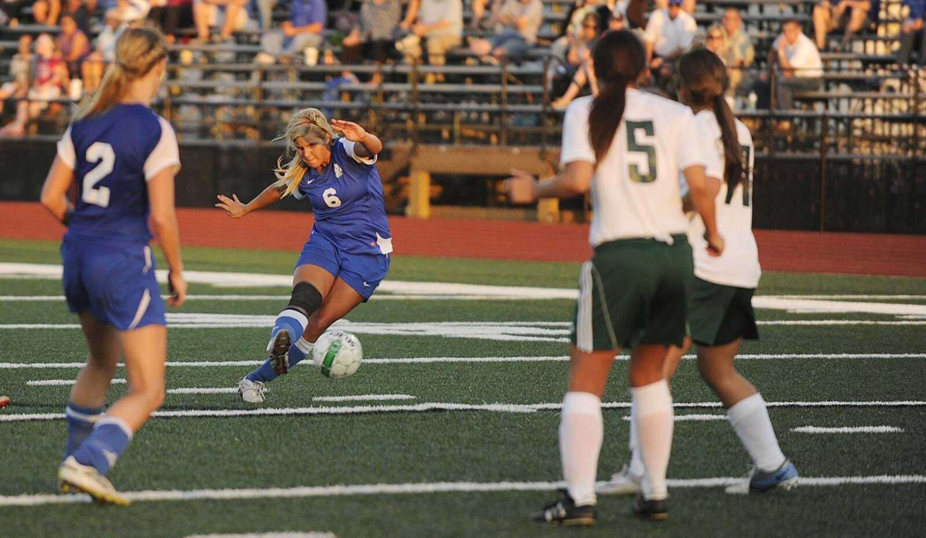 Notre Dame midfielder Brianne Sanders fires the winning shot in overtime against De Soto on Tuesday to propel the Bulldogs into the Class 2 state quarterfinals. The Bulldogs defeated the Dragons 2-1 in the sectional game in De Soto, Mo. See more game photos at semoball.com. (ADAM VOGLER)