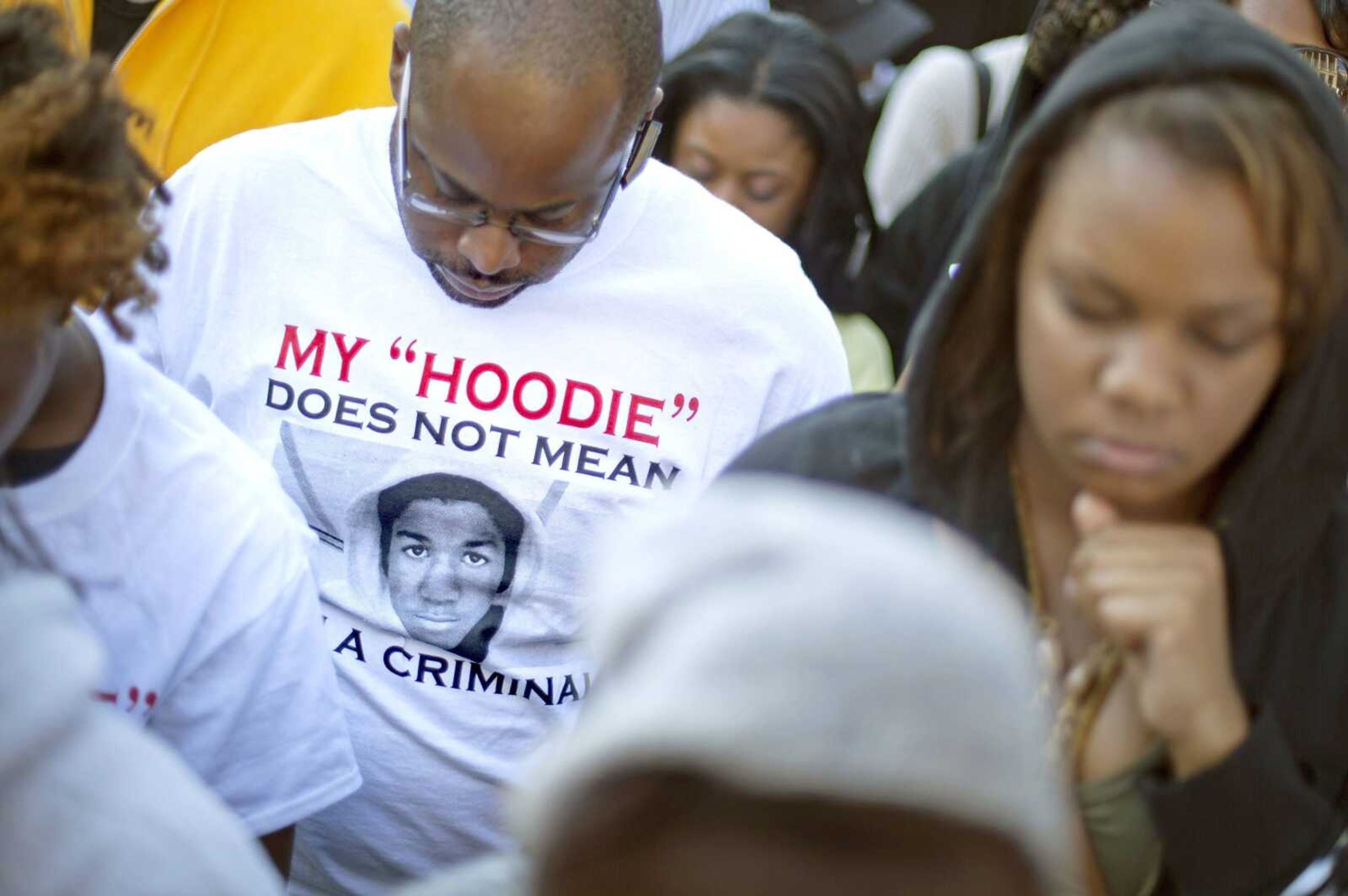 Andre Parker of Atlanta wears a T-shirt in memory of Trayvon Martin during a rally Monday outside the Georgia Capitol in Atlanta. <br>David Goldman<br>Associated Press