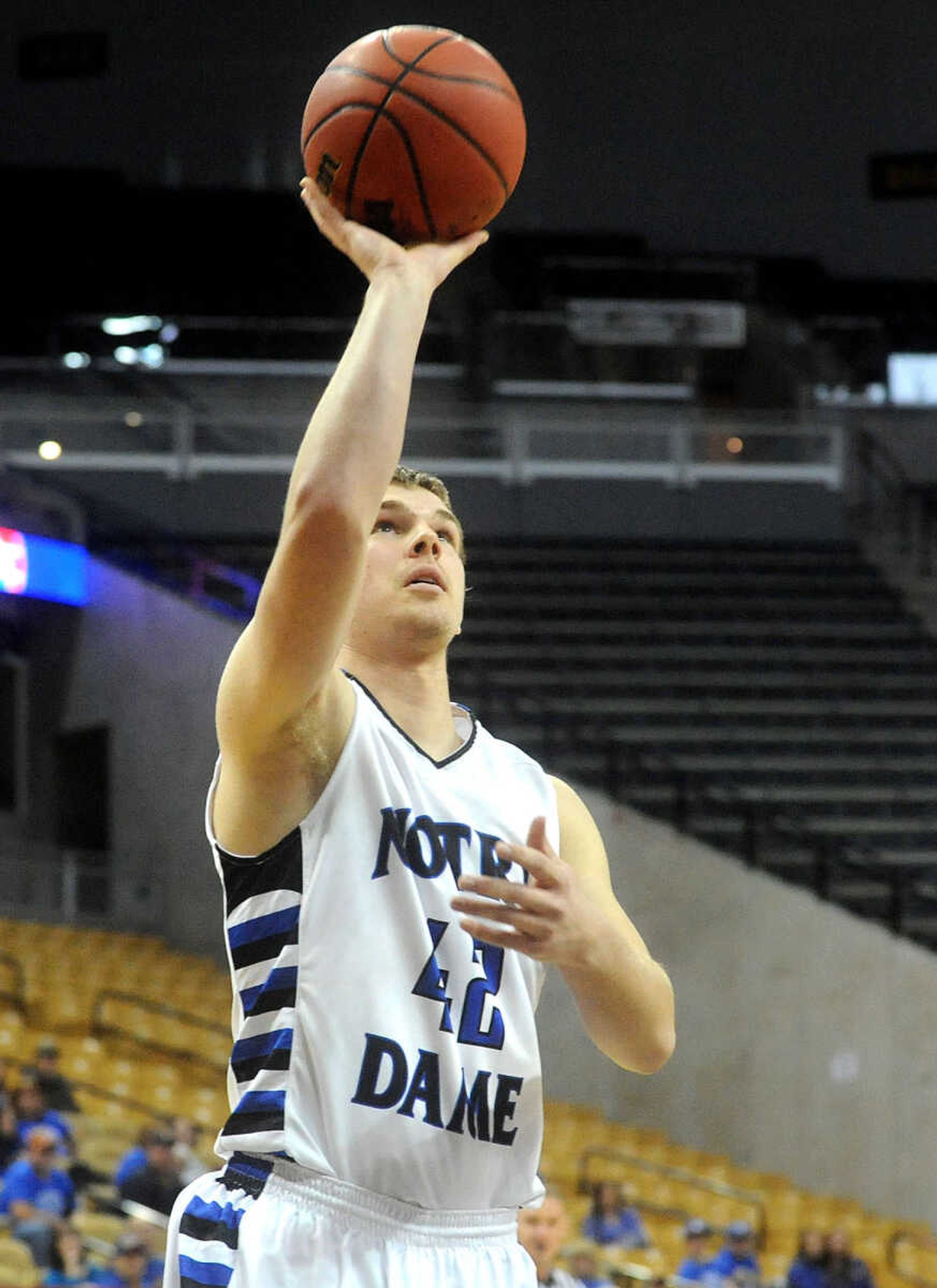 Notre Dame's Derek Hulshof makes the last basket of the Bulldogs Class 4 third-place game against the Bolivar Liberators, Friday, March 20, 2015, in Columbia, Missouri. Notre Dame won 65-44. (Laura Simon)