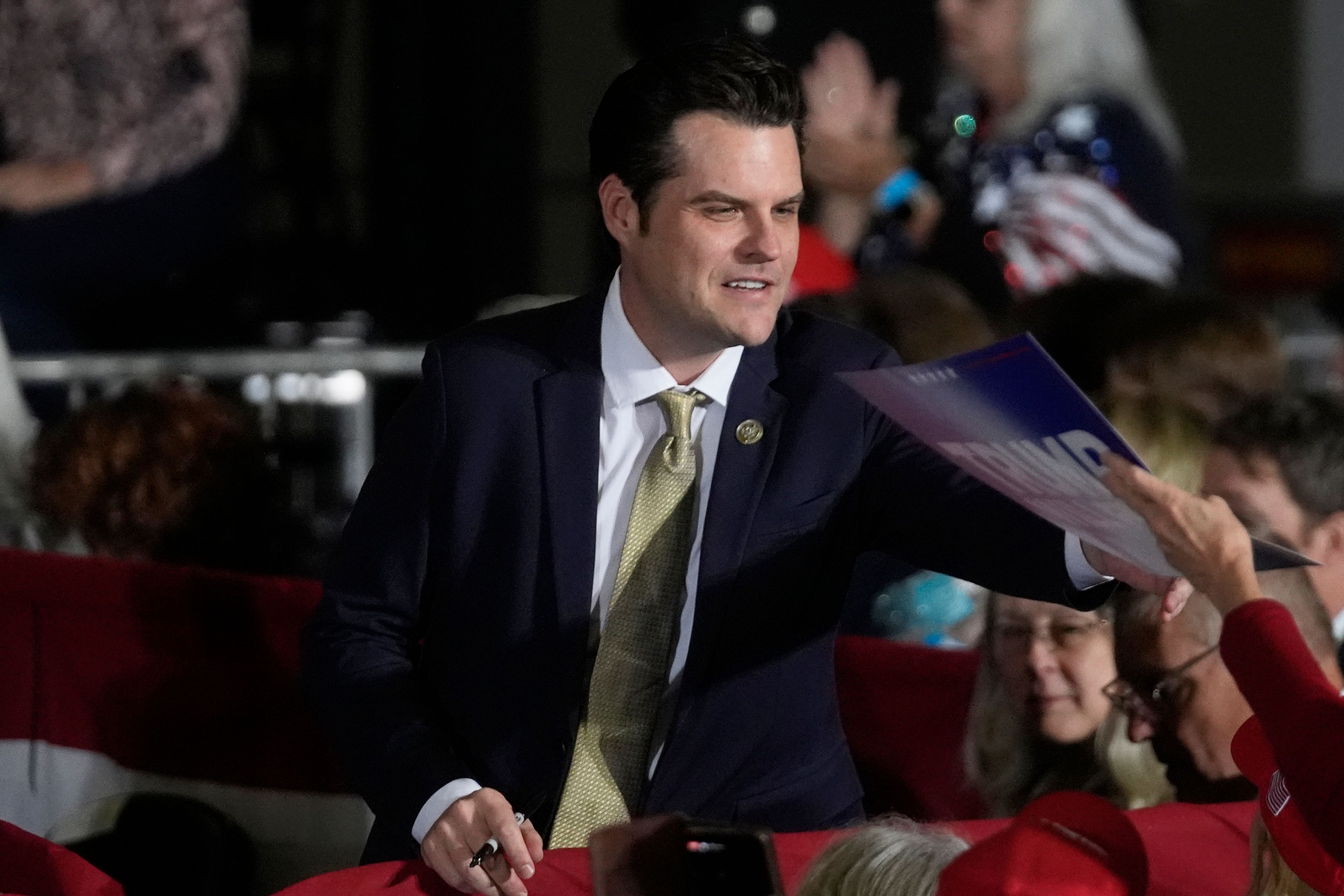 Rep. Matt Gaetz, R-Fla., signs autographs at a campaign event for Republican vice presidential nominee Sen. JD Vance, R-Ohio, Monday, Nov. 4, 2024, in Atlanta. (AP Photo/John Bazemore)