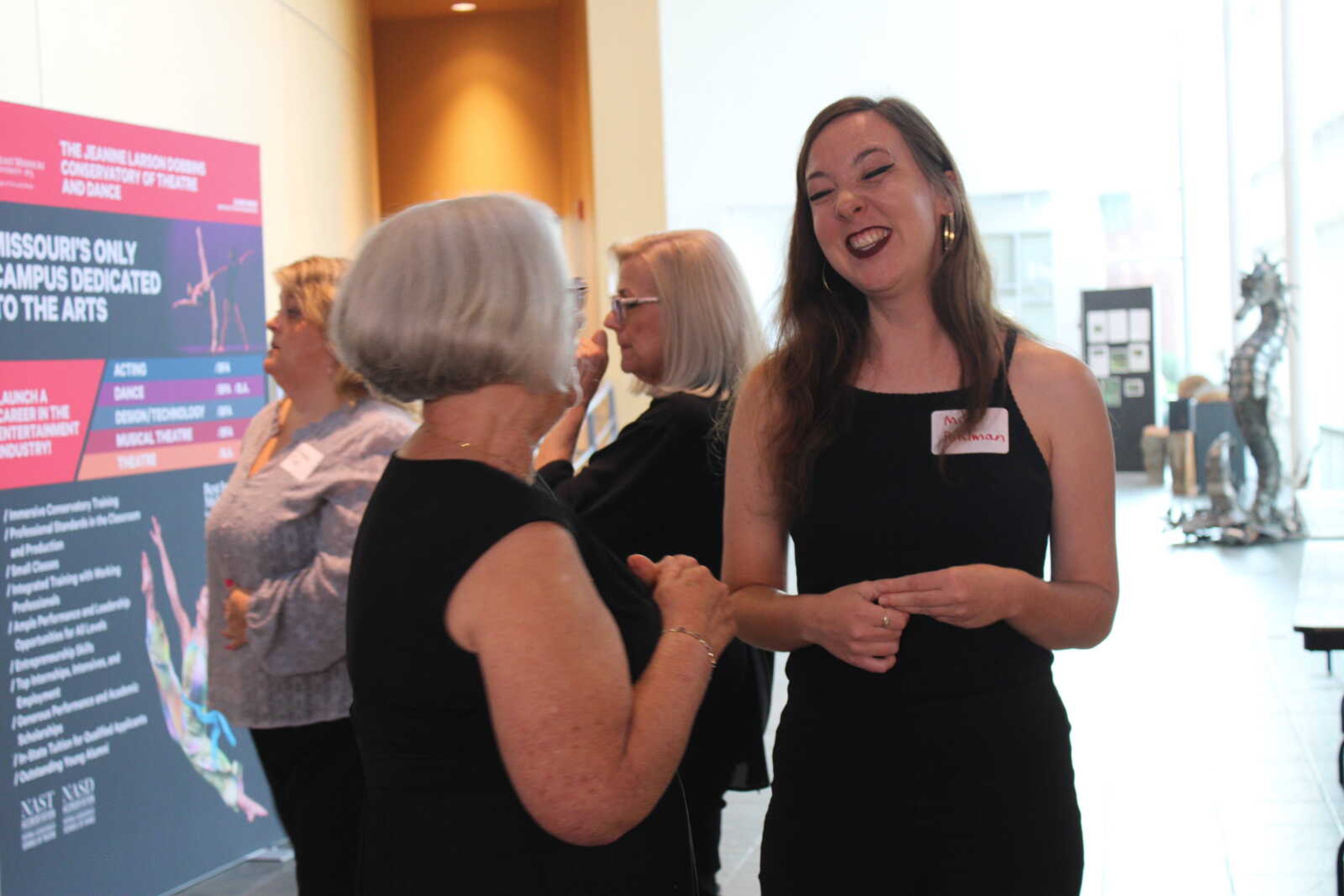 Difference Makers Mia Pohlman and Avon Crocker mingle before the ceremony begins.&nbsp;