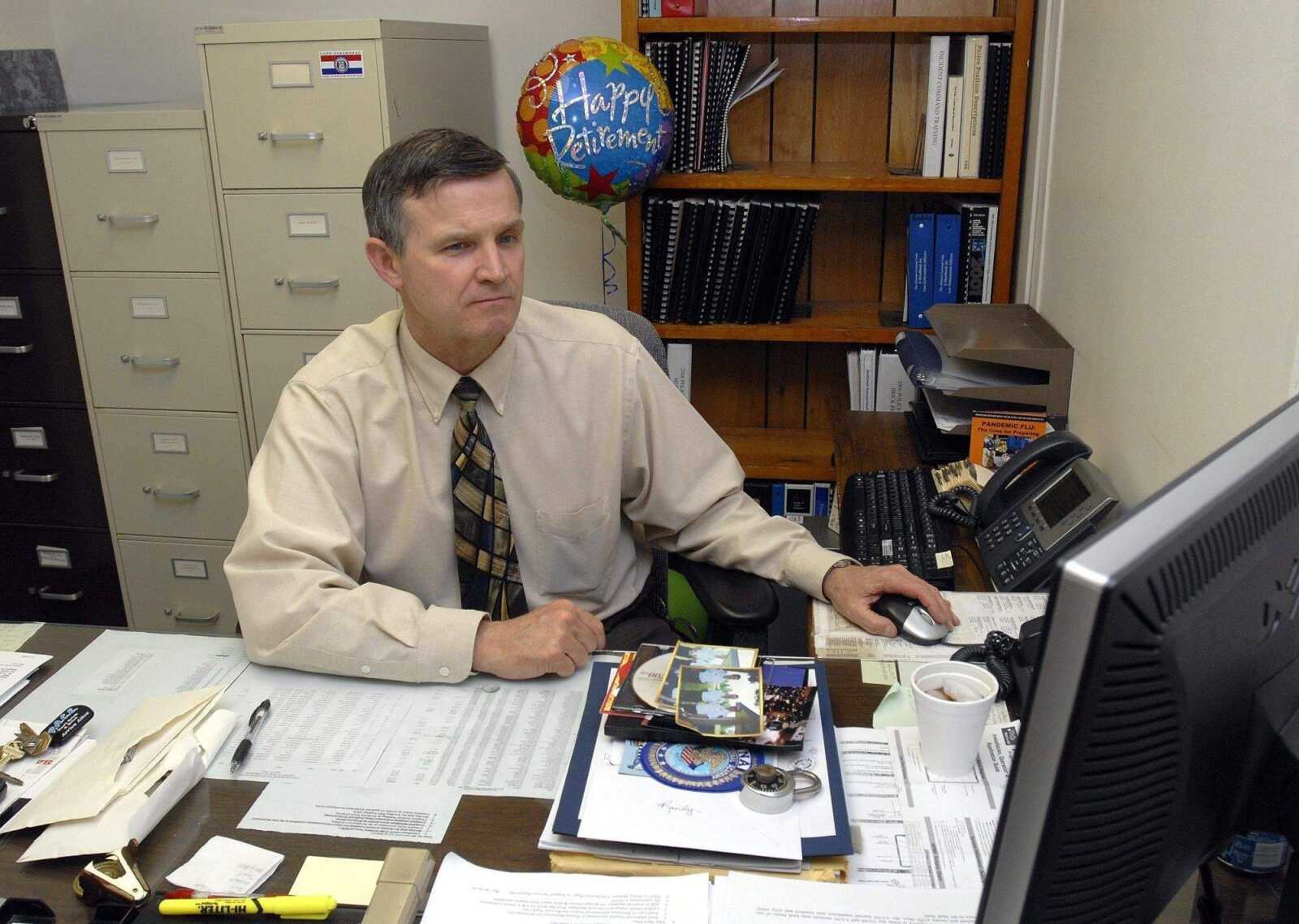 FRED LYNCH ~ flynch@semissourian.com<br>Assistant police chief Randy Roddy finishes his last day with the Cape Girardeau Police Department in his office on Friday.