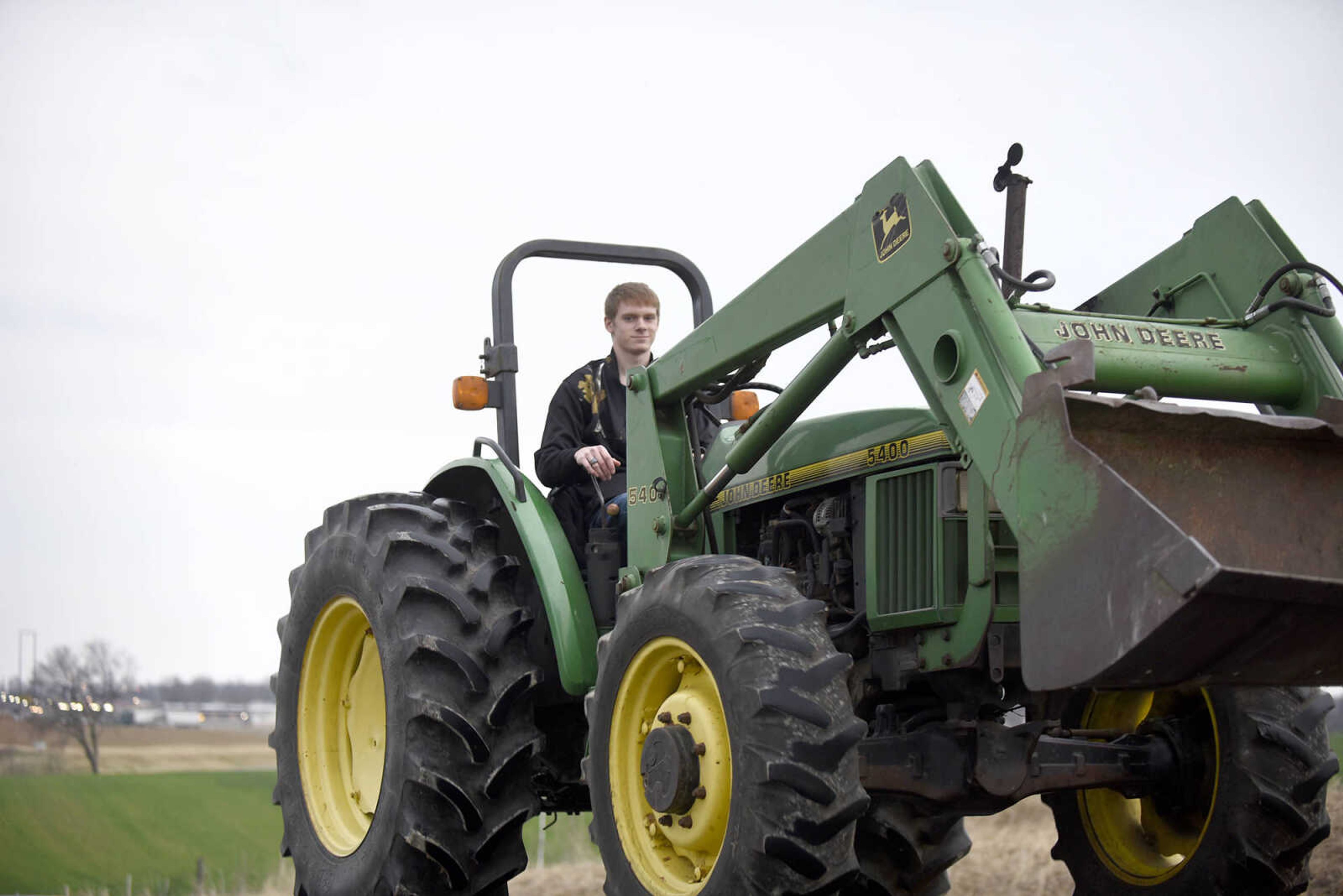 Saxony Lutheran High School FFA students take to the road on their tractors during drive your tractor to school day on Tuesday morning, Feb. 21, 2017. Students began their journey to school from Davis Farm Supply on Highway 61 in Jackson as part of FFA Week.