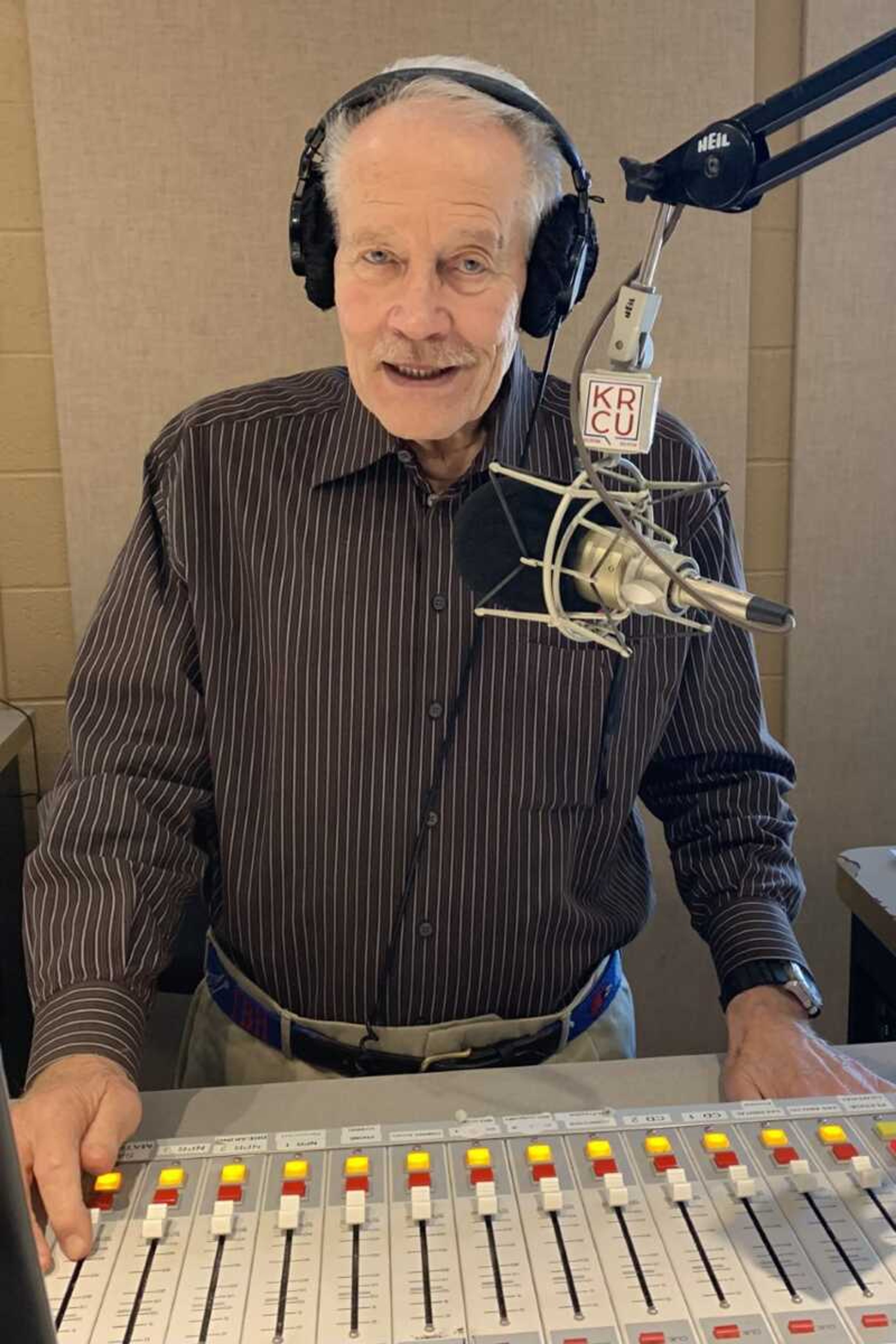 Tom Harte at the microphone in KRCU Radio's studio. Harte will retire from his hosting duties of the fine dining-themed, classical music program "Caffe Concerto" on Friday, April 28.