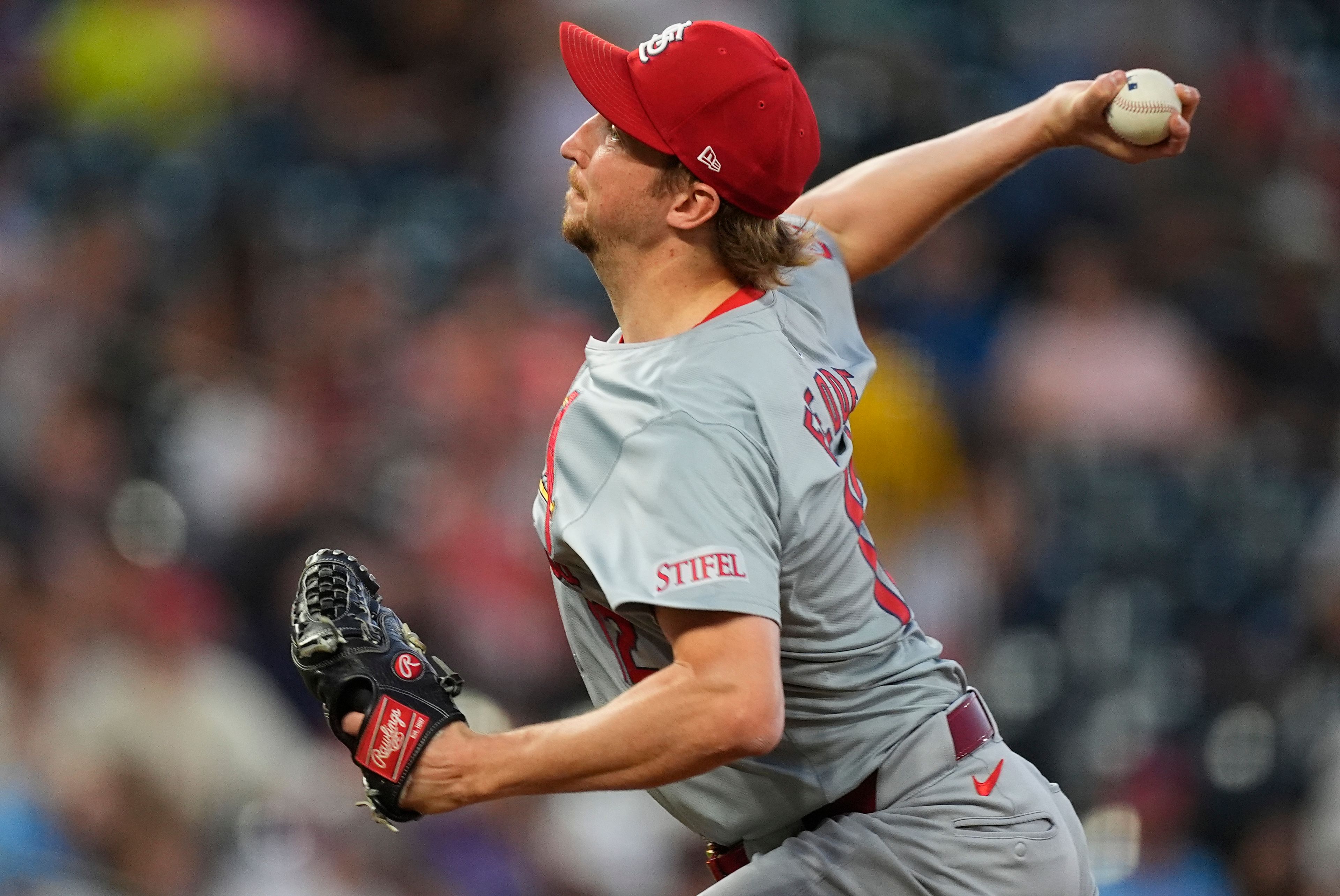 St. Louis Cardinals starting pitcher Erick Fedde works against the Colorado Rockies in the first inning of a baseball game Wednesday, Sept. 25, 2024, in Denver. (AP Photo/David Zalubowski)