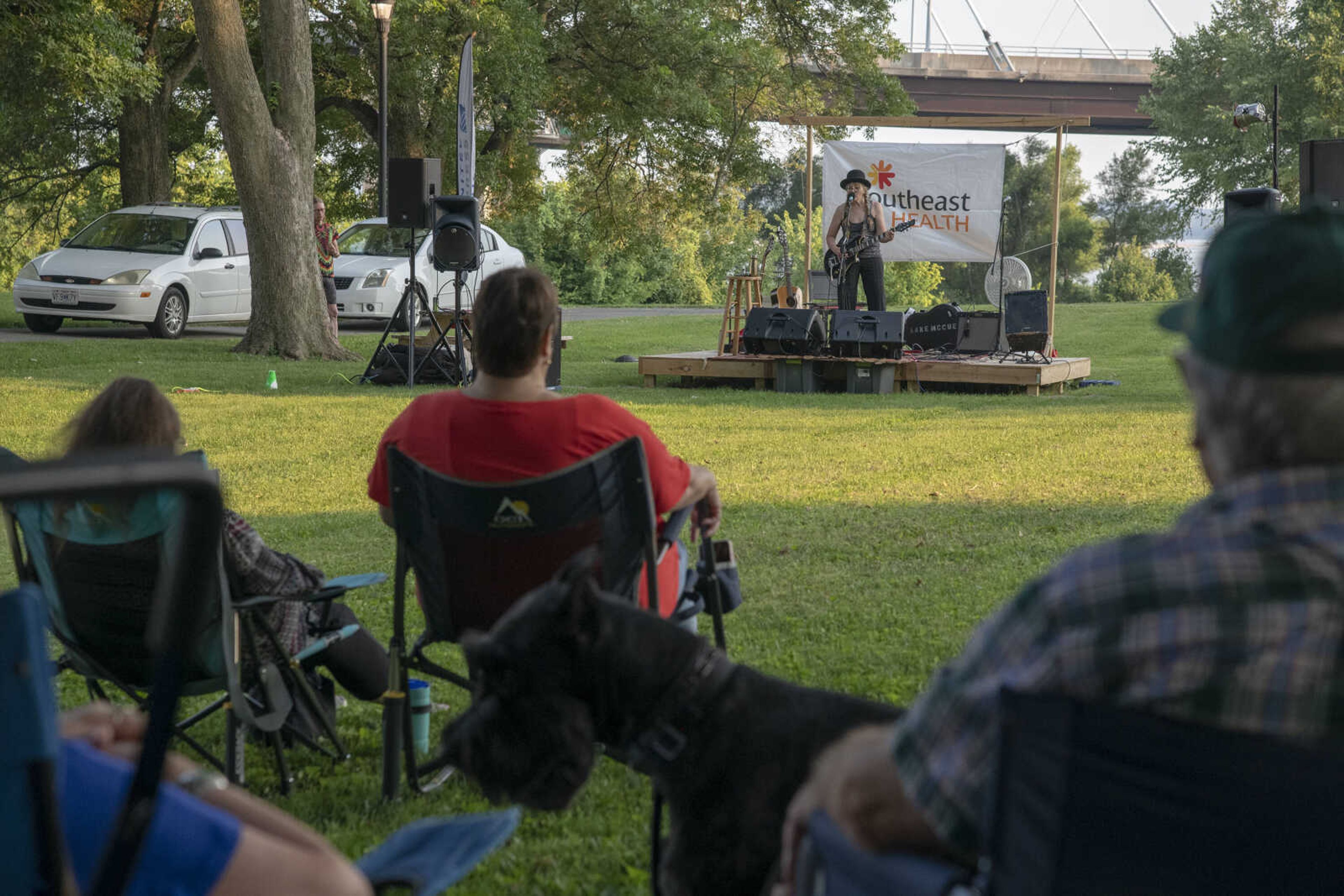 The audience watches as Anne McCue performs during Tunes at Twilight at the River Campus Friday Aug. 6, 2021.