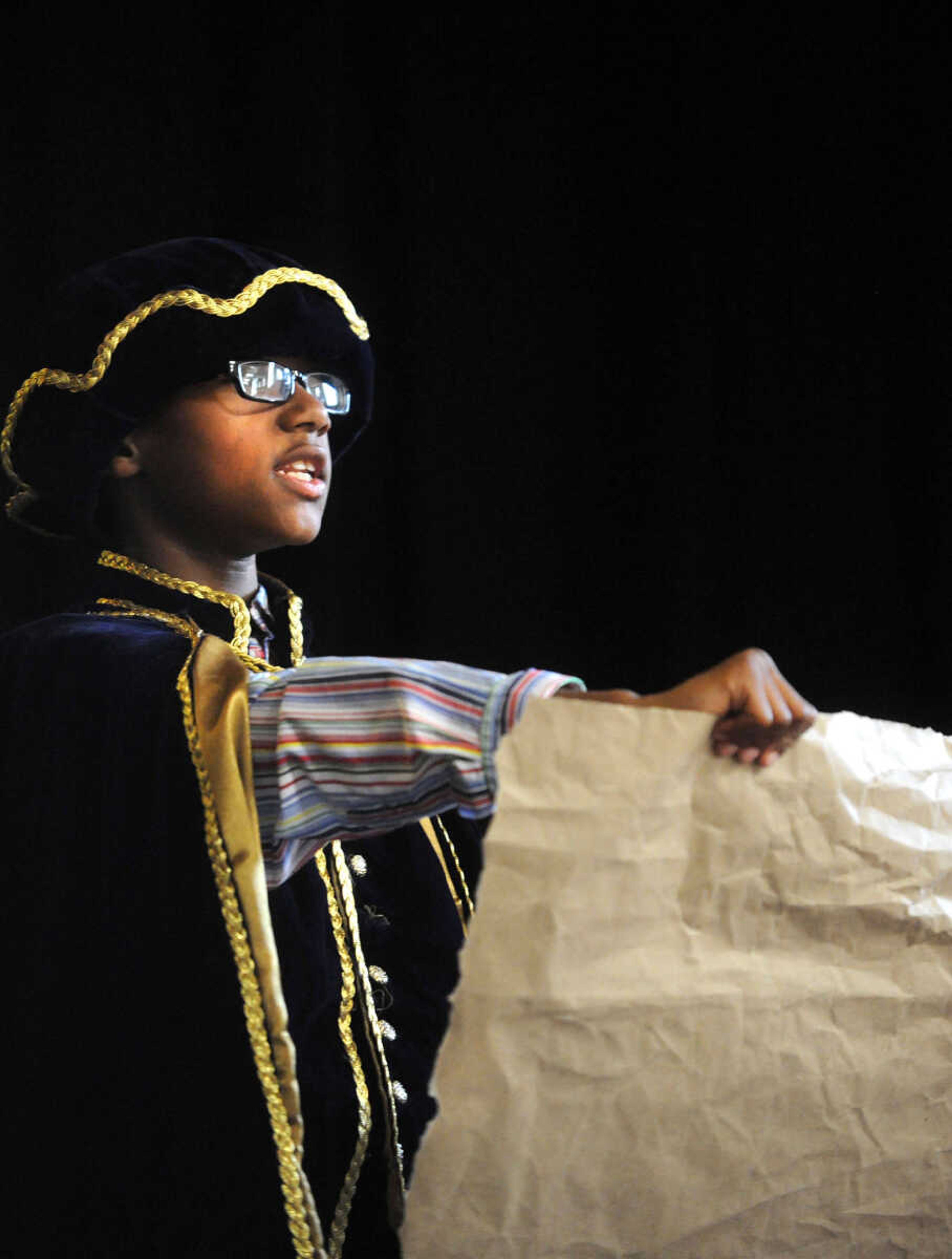 LAURA SIMON ~ lsimon@semissourian.com

Alma Schrader Town Crier Andre Johnson reads a proclamation, Wednesday, Sept. 18, 2013, during 12th annual Constitution Day and Heroes Recognition Assembly.