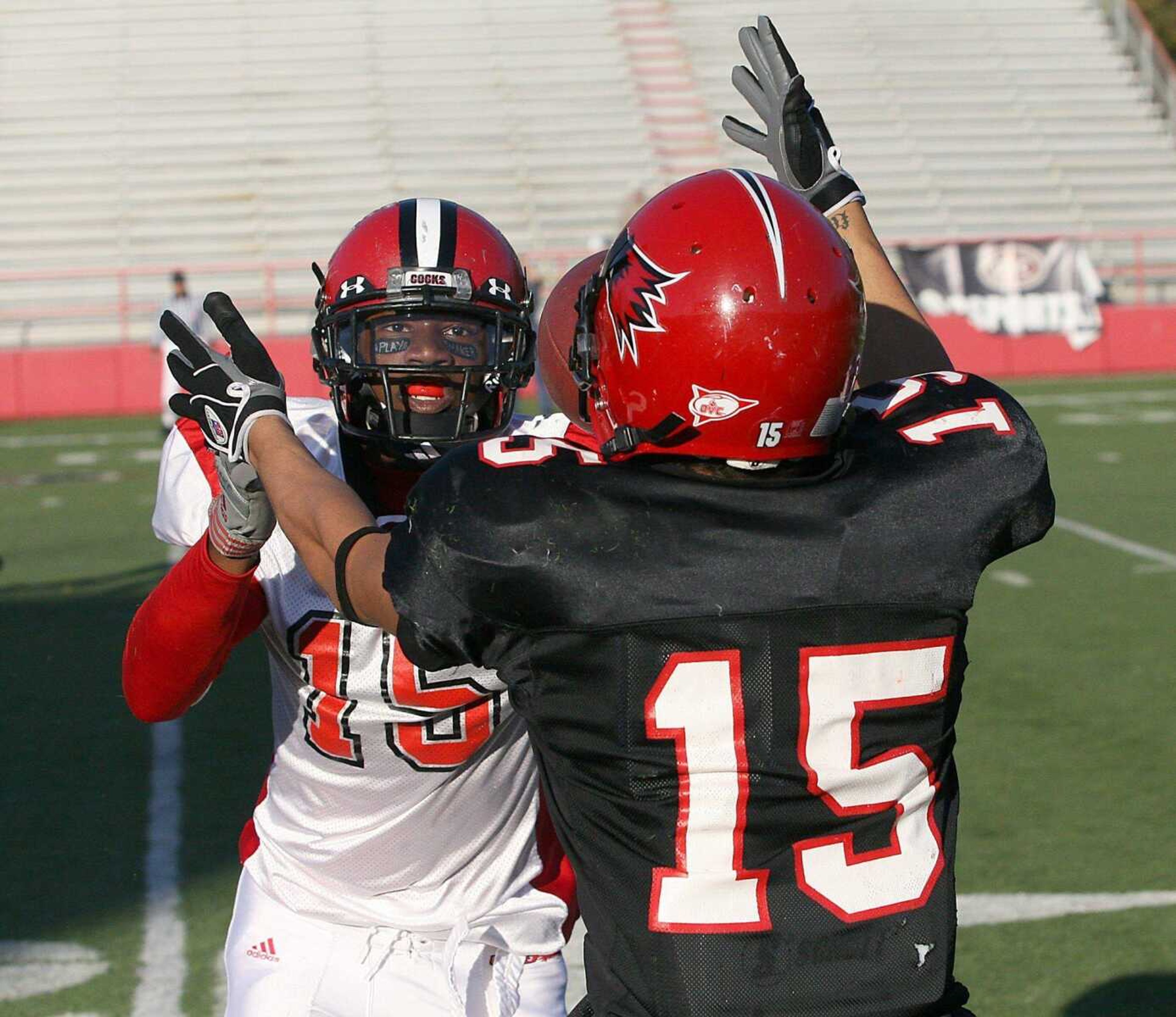 Southeast Missouri State receiver Walter Peoples, right, tried to make a catch against the defense of Jacksonville State defensive back T.J. Heath during Saturday's game at Houck Stadium. (MIKE WILLIAMSON ~ Special to the Southeast Missourian)