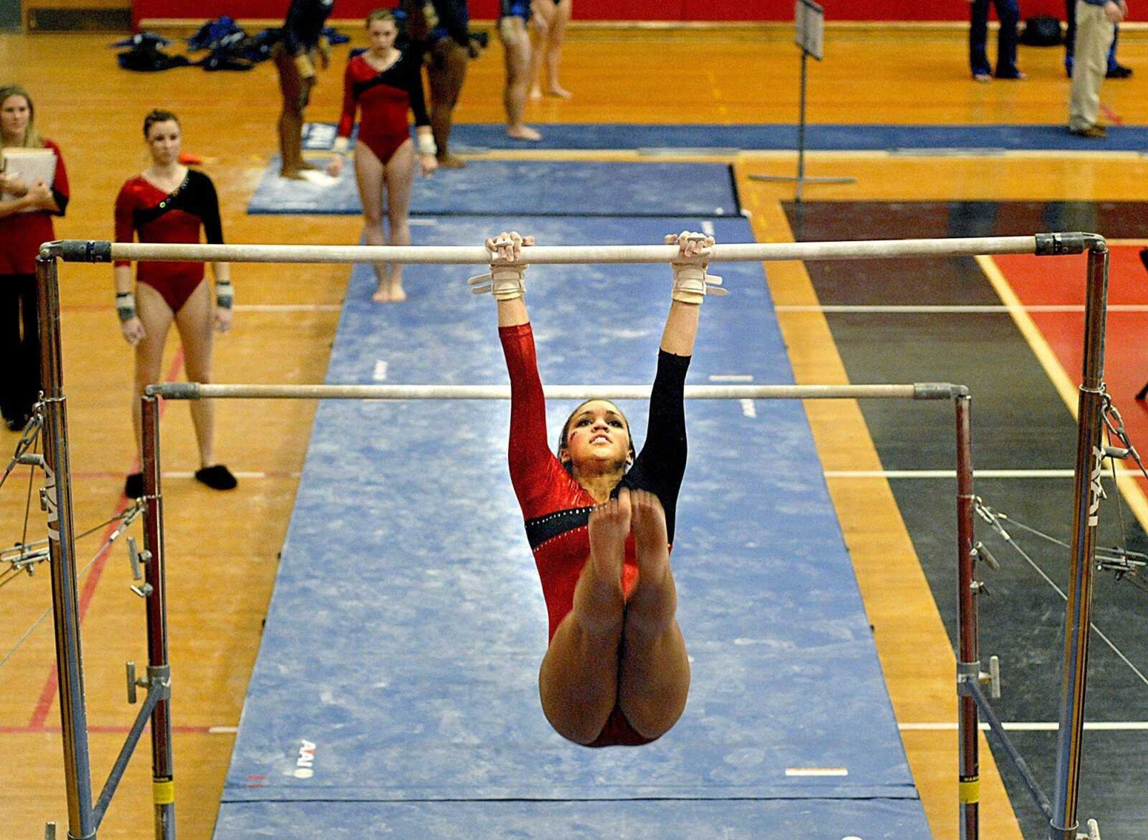 Rikara Turner performs on the uneven bars during Southeast Misssouri State University's gymnastics meet against Kentucky on Friday, January 18, 2007 at Houck Stadium Field House. (Aaron Eisenhauer)