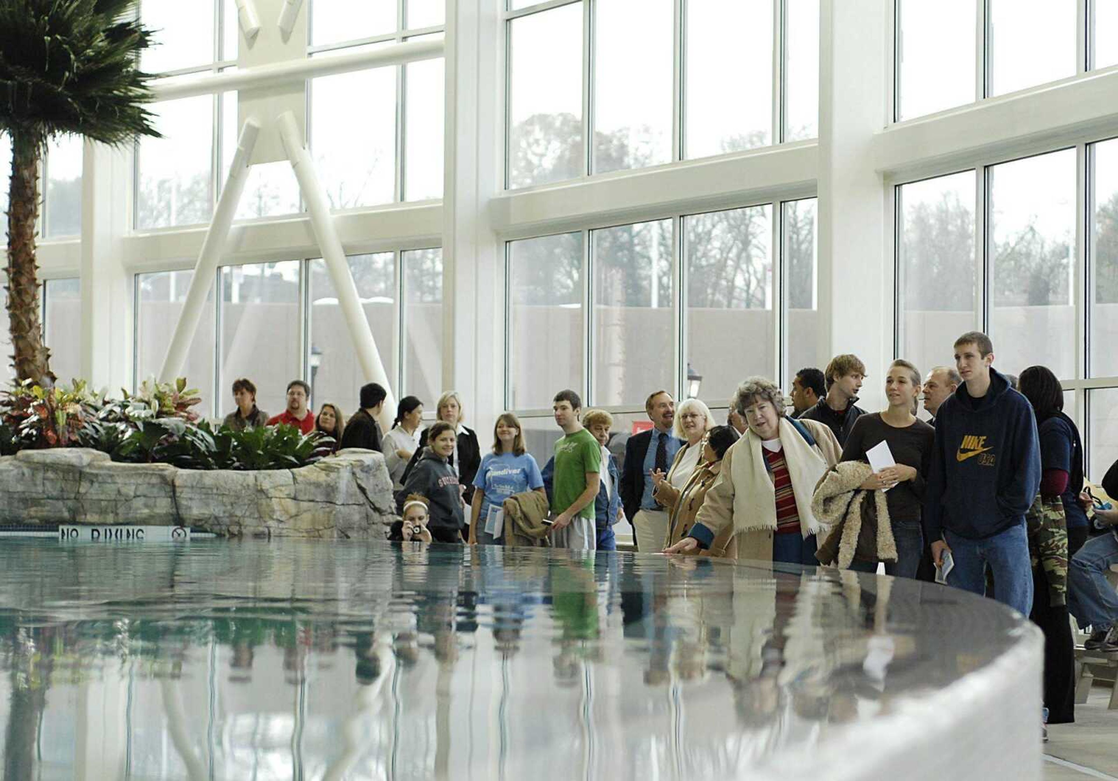 Following the ribbon-cutting ceremony Friday, a crowded filtered into the new Student Aquatic Center for a tour. (Aaron Eisenhauer)