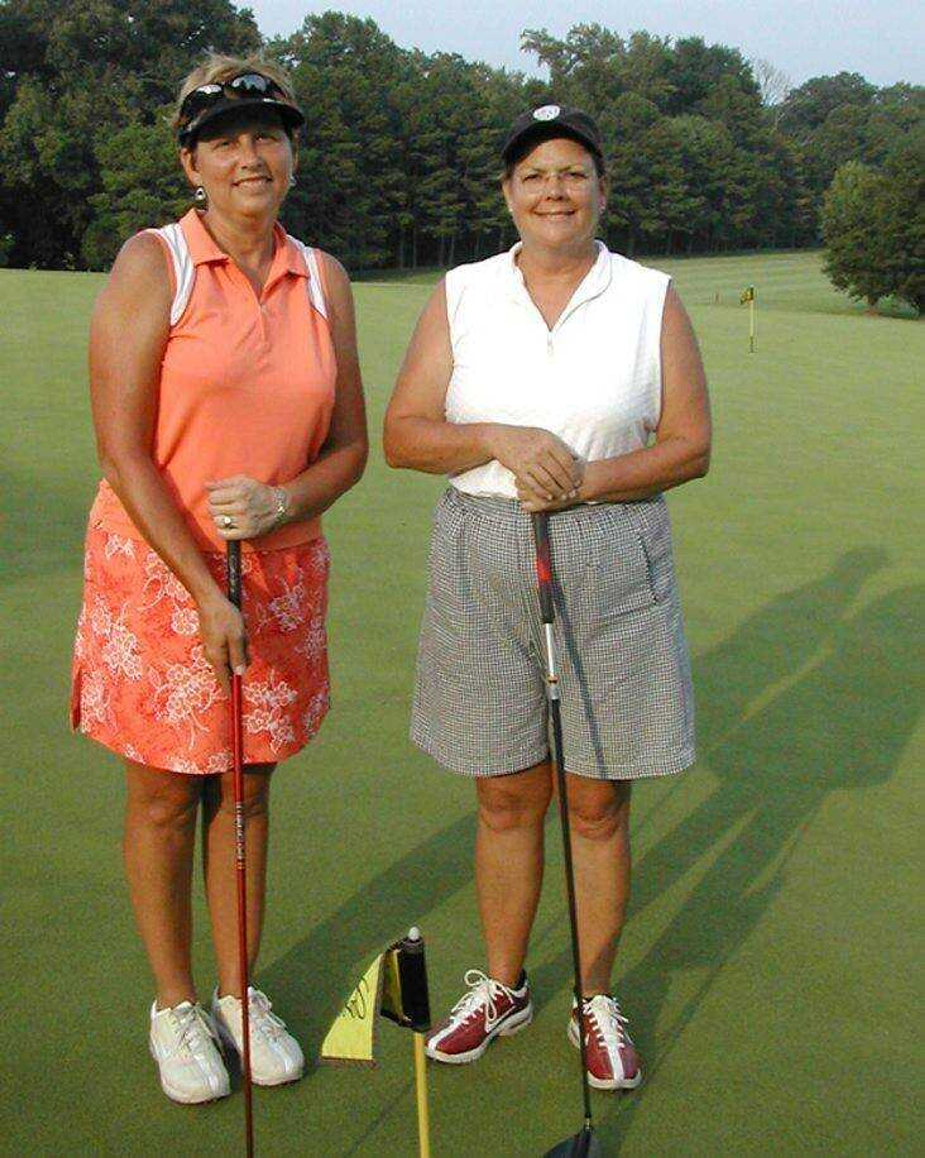 Diane Fowler, left, and Harriette Myers shot 6-under par over the final nine holes last year to win their seventh Lassies Classic title. (Southeast Missourian file)