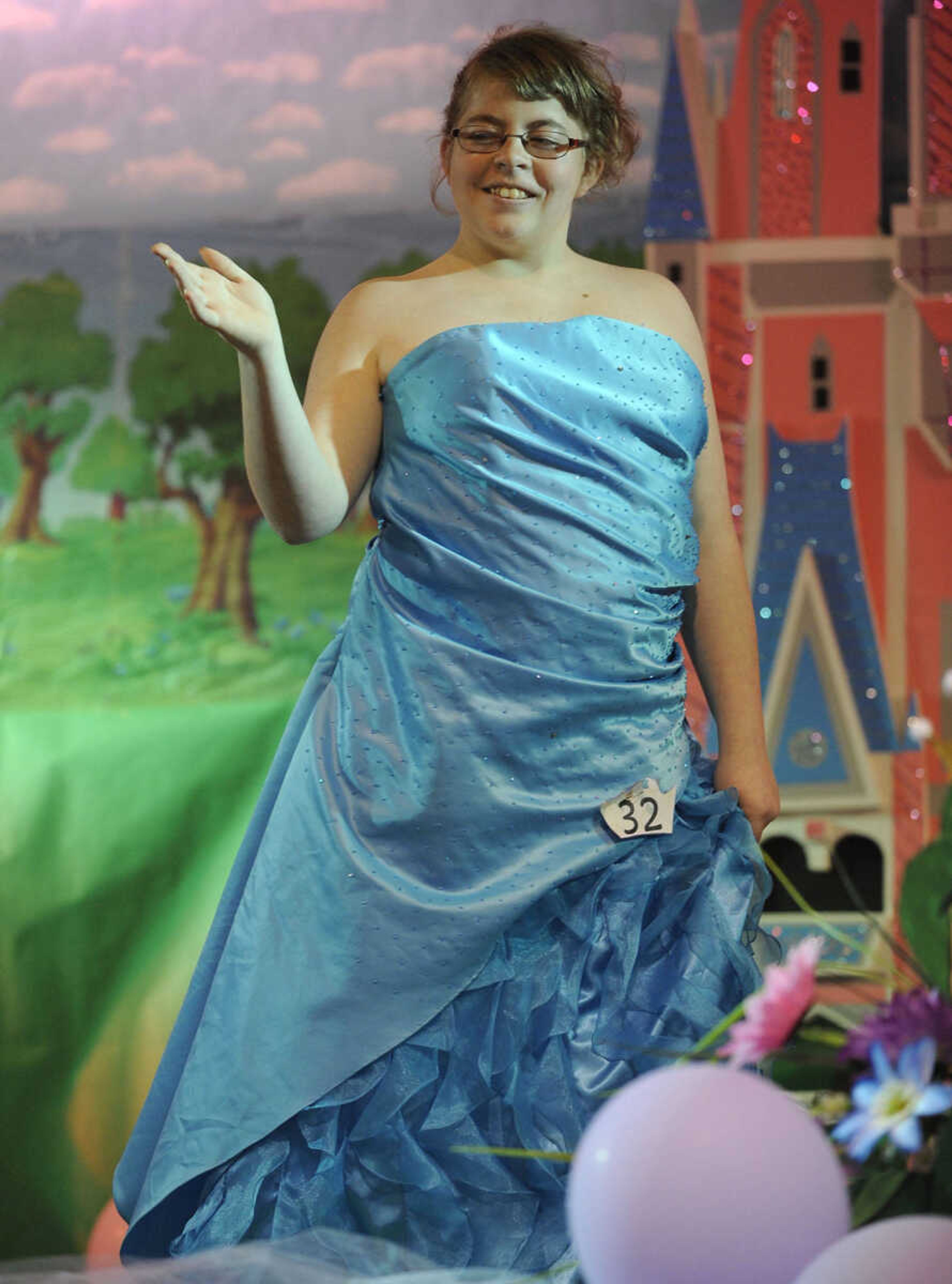 Morgan Schubert poses for the judges in the 15-19 age division of the S. E. Missouri Angels Pageant on Saturday, April 26, 2014 at Scott City High School.