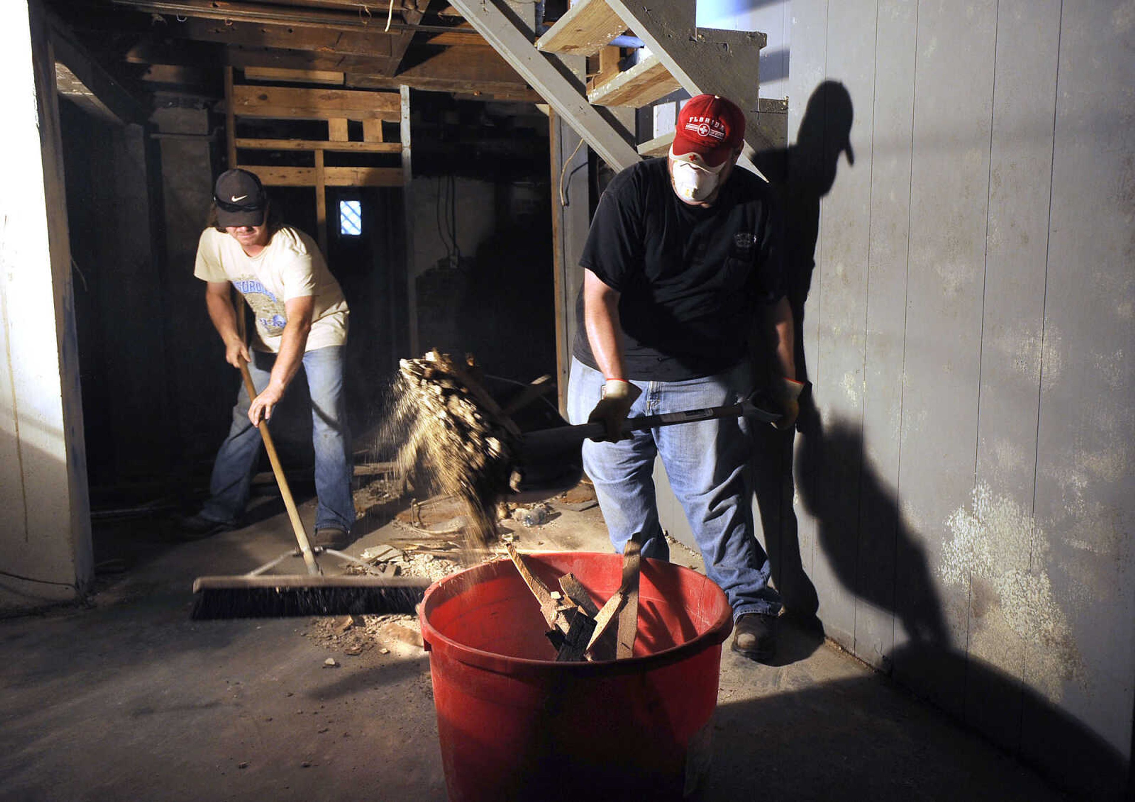 FRED LYNCH ~ flynch@semissourian.com
Schyler Trankler, left, and Mathus Williams clean up the basement in the veterans transition house Saturday, Sept. 10, 2016 as part of the United Way Days of Caring in Cape Girardeau.