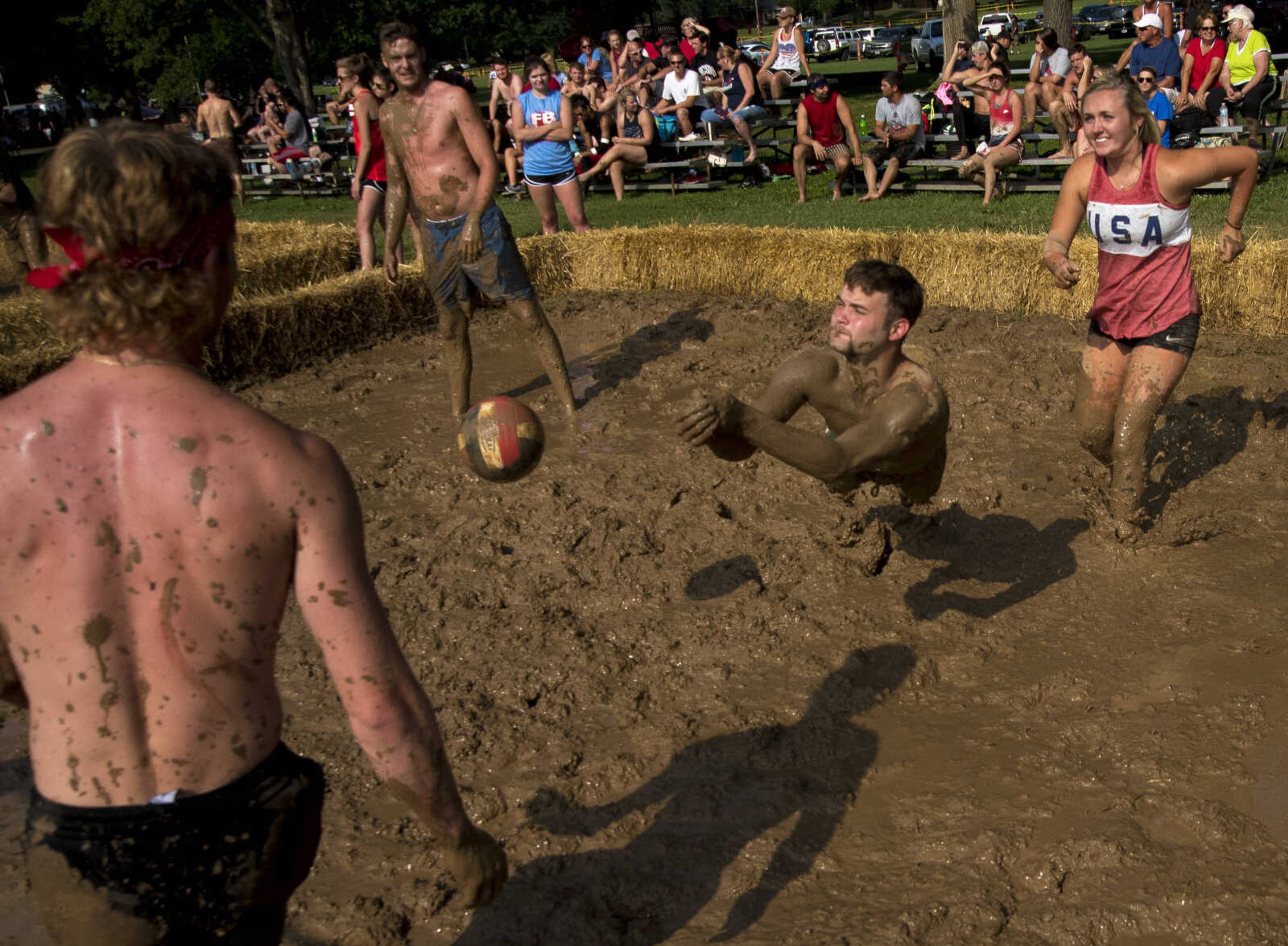 People play mud volleyball for the Jackson Parks and Recreation's July 4th celebration Tuesday, July 4, 2017 in Jackson City Park.