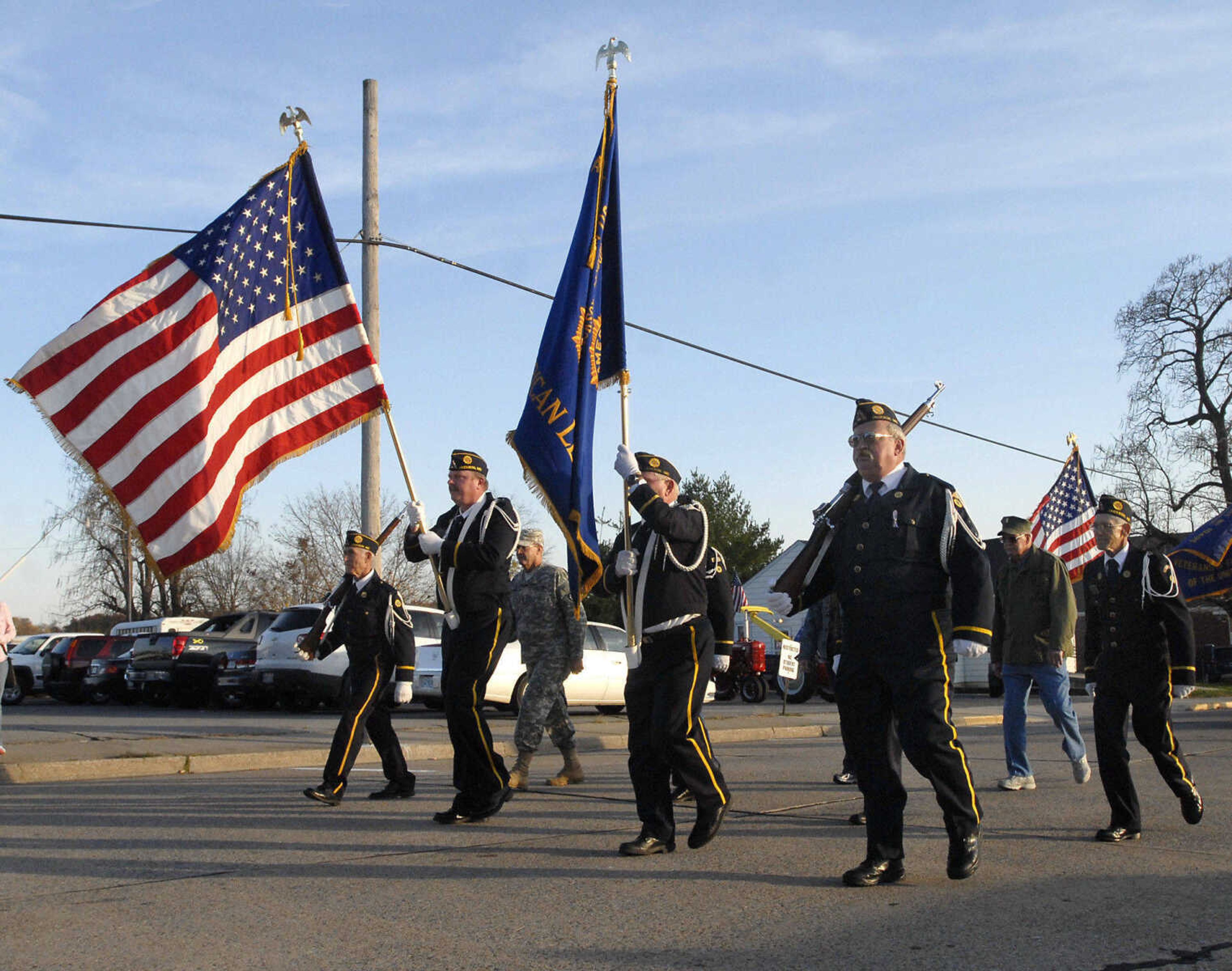 The American Legion Post 158 Honor Guard leads the Veterans Day Parade on Friday, Nov. 11, 2011, in Jackson. (Kristin Eberts)