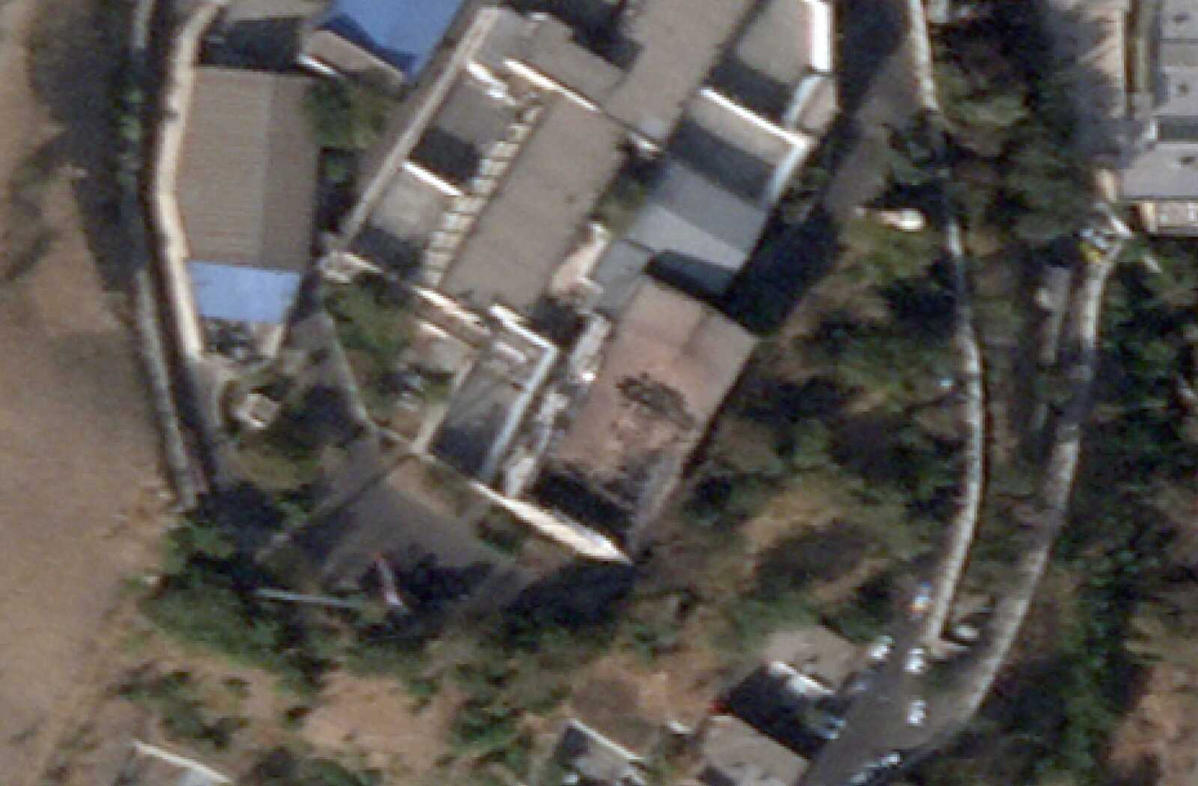 This cropped image of a satellite photo shows Evin prison Sunday, Oct. 16, in Tehran, Iran, after a fire at the complex amid ongoing national protests in the country. Iran's judiciary raised the death toll Monday in a blaze at the prison, saying that at least eight prisoners were killed.