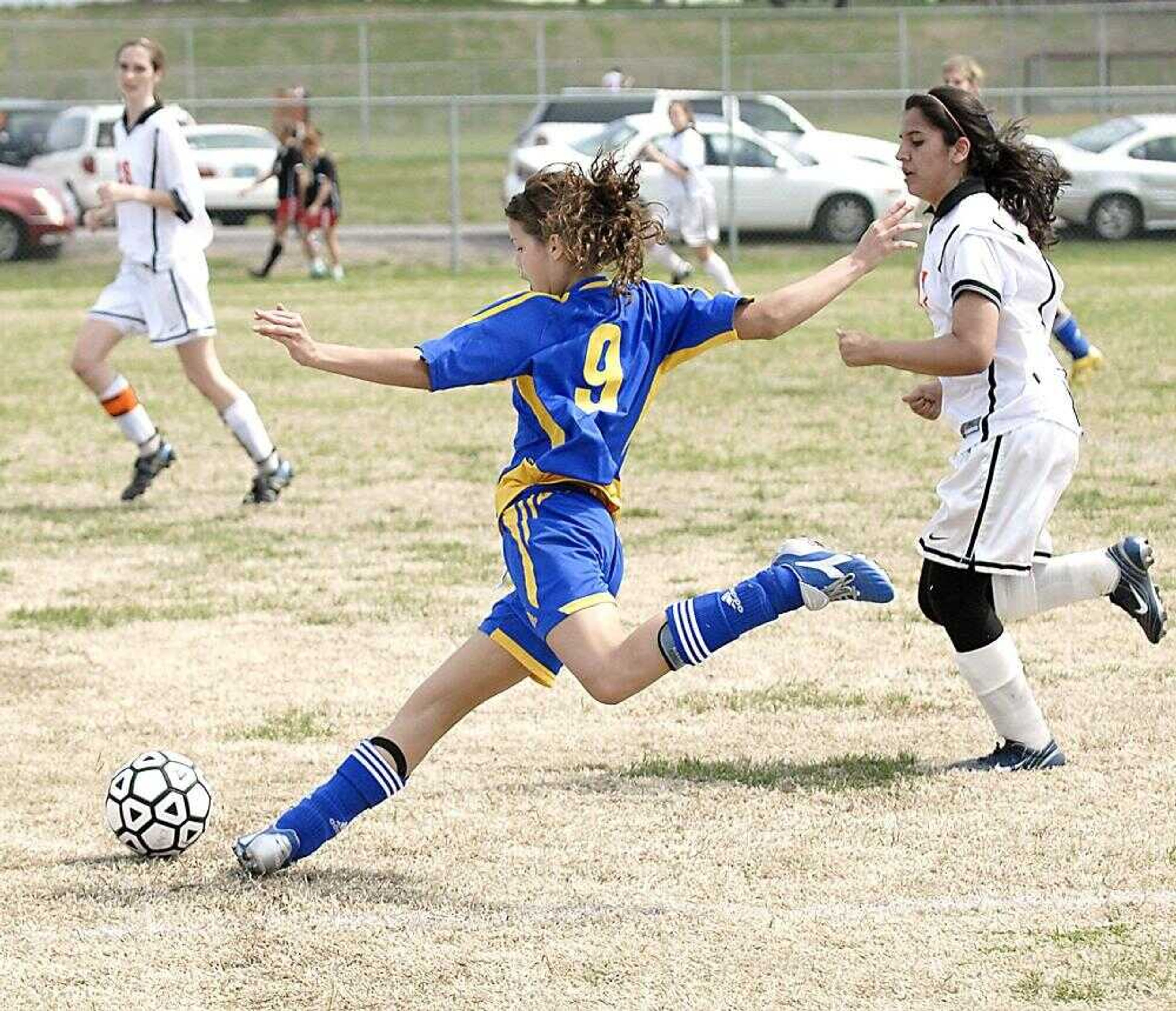 St. Vincent sophomore Courtney Besand made a crossing pass during the second half of St. Vincent's 1-0 win over Central for third place Saturday in the Noon Optimist tournament at Central. (Kit Doyle)