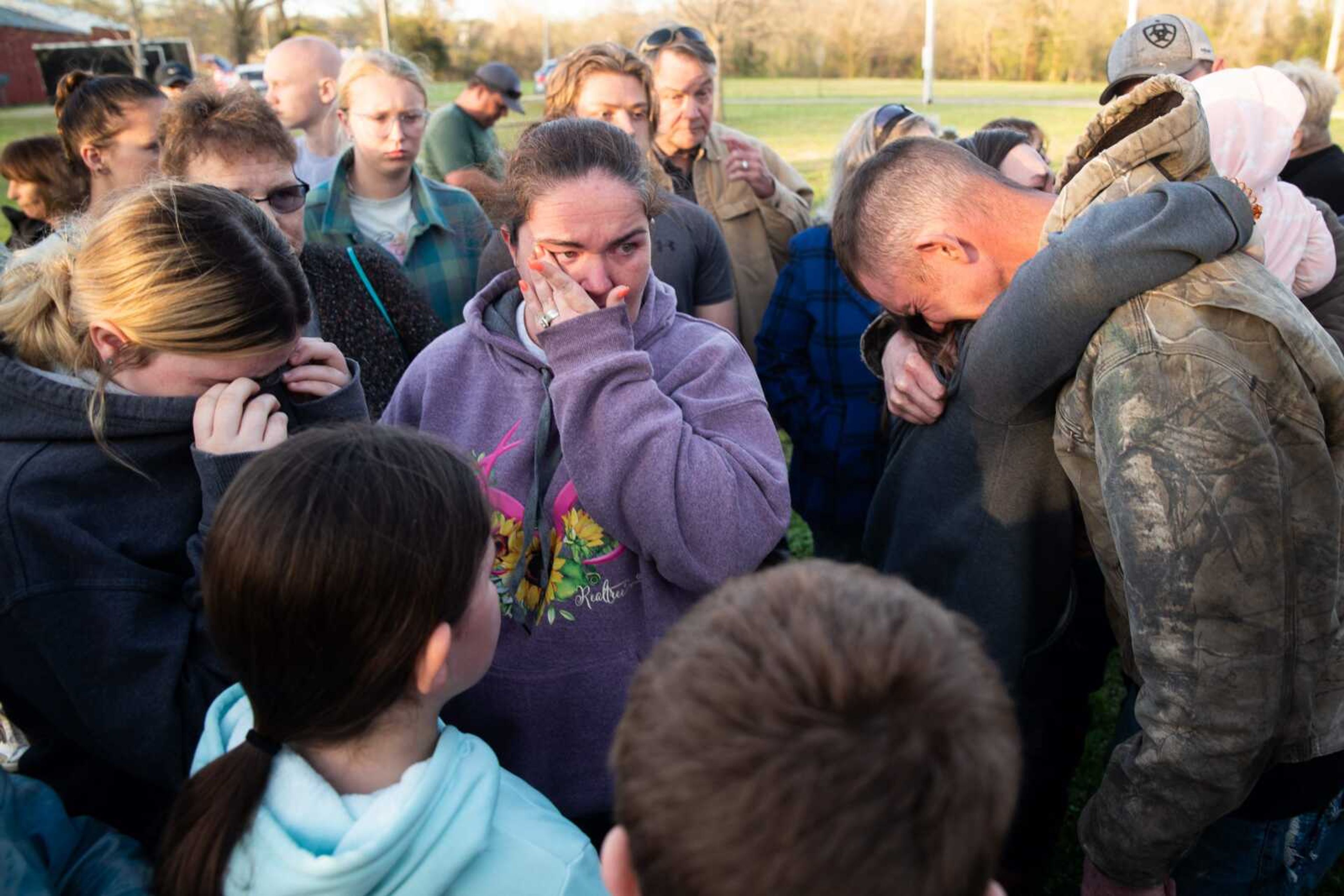 The Shipley family mourns the loss of loved ones at a prayer vigil on Wednesday, April 5, who were killed by the tornado.