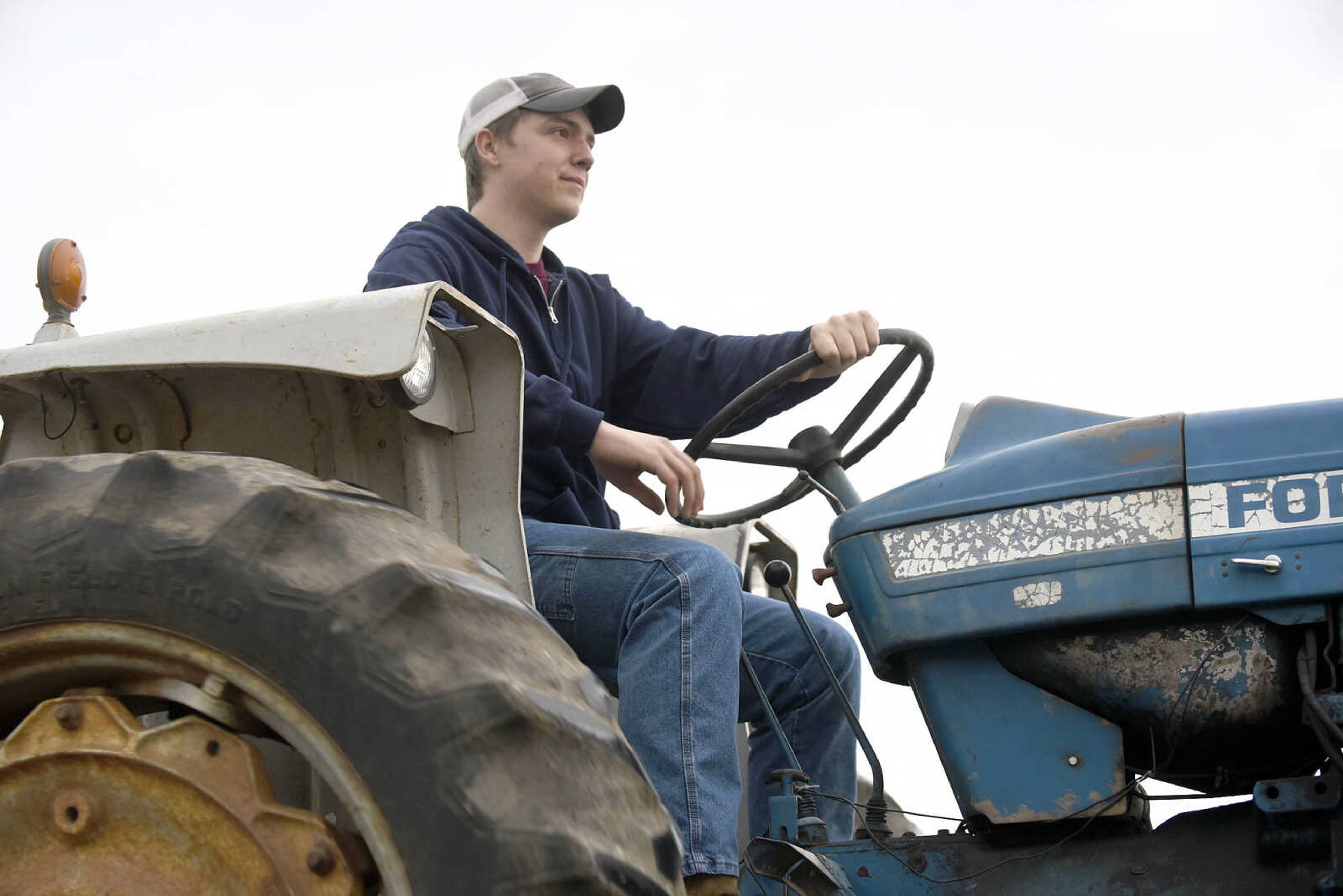 Saxony Lutheran High School FFA students take to the road on their tractors during drive your tractor to school day on Tuesday morning, Feb. 21, 2017. Students began their journey to school from Davis Farm Supply on Highway 61 in Jackson as part of FFA Week.