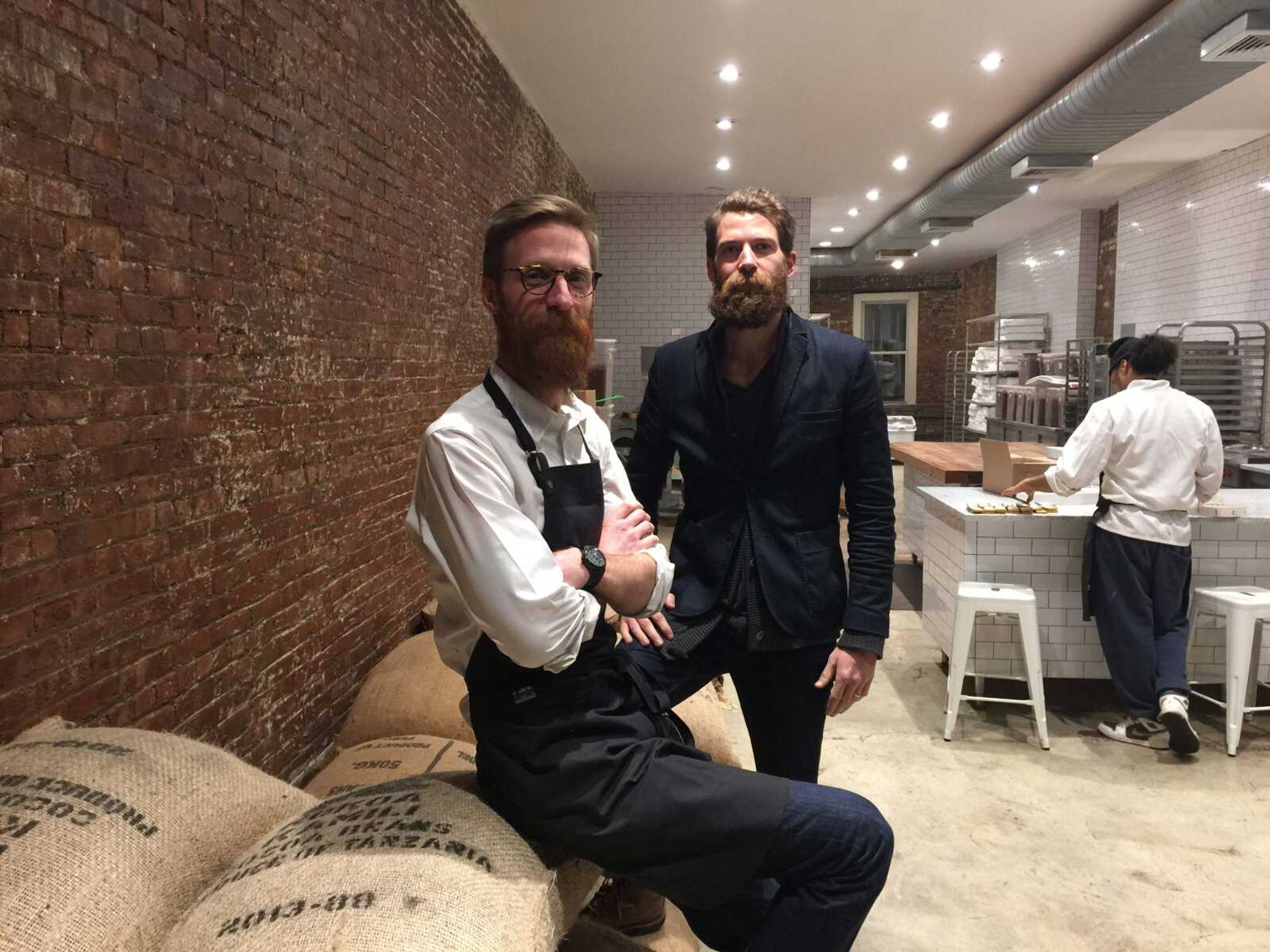 Brothers Rick and Michael Mast pose for a photo Wednesday at their chocolate factory in the Brooklyn borough of New York. DallasFood.org published a series about Rick and Michael Mast, whose stylishly wrapped chocolate bars can cost $10 each. (Candice Choi ~ Associated Press)