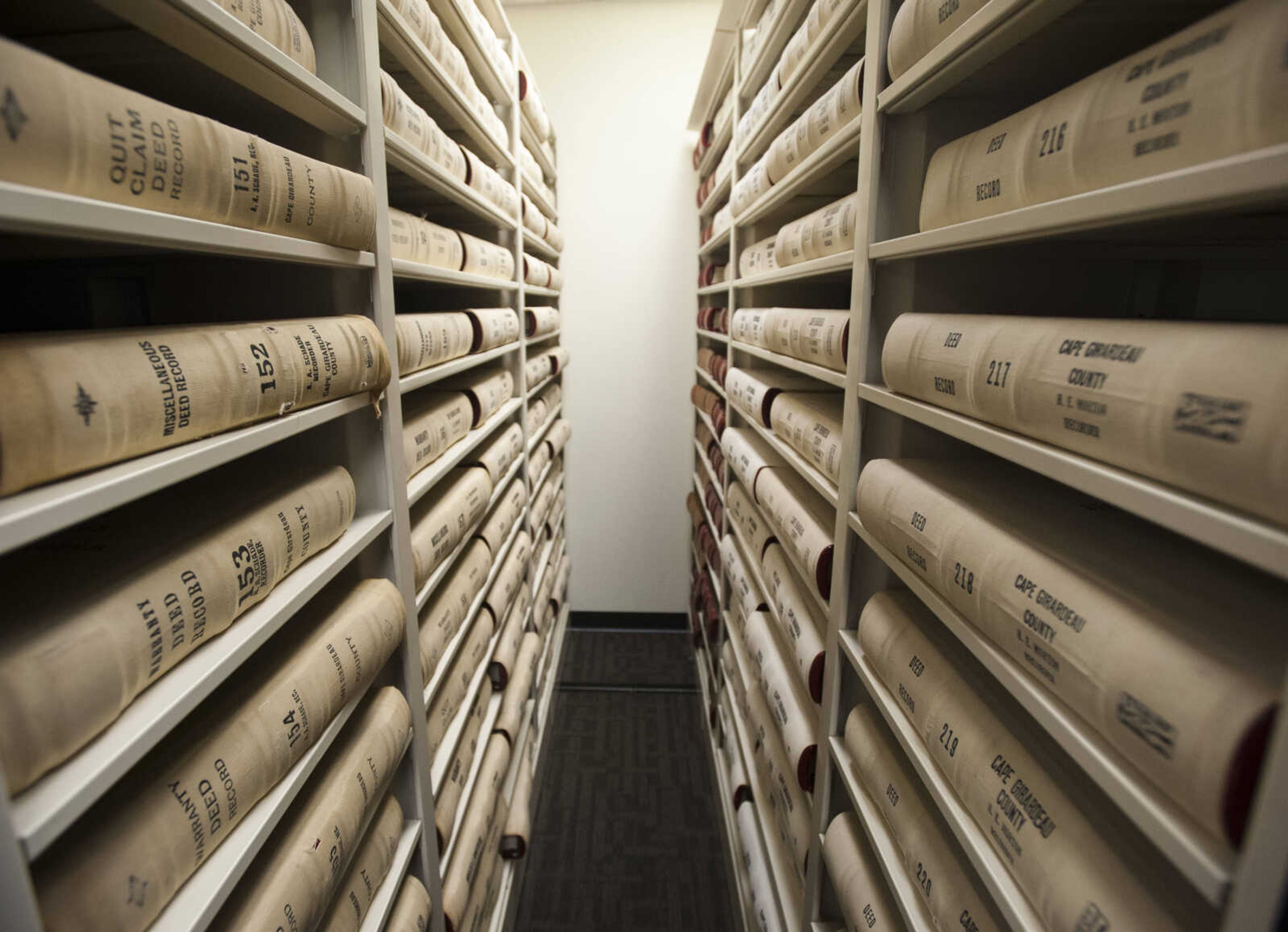 A row of shelved deed records sits Thursday, March 8, 2018, in the Recorder's Office at the Cape County Administration Building in Jackson.