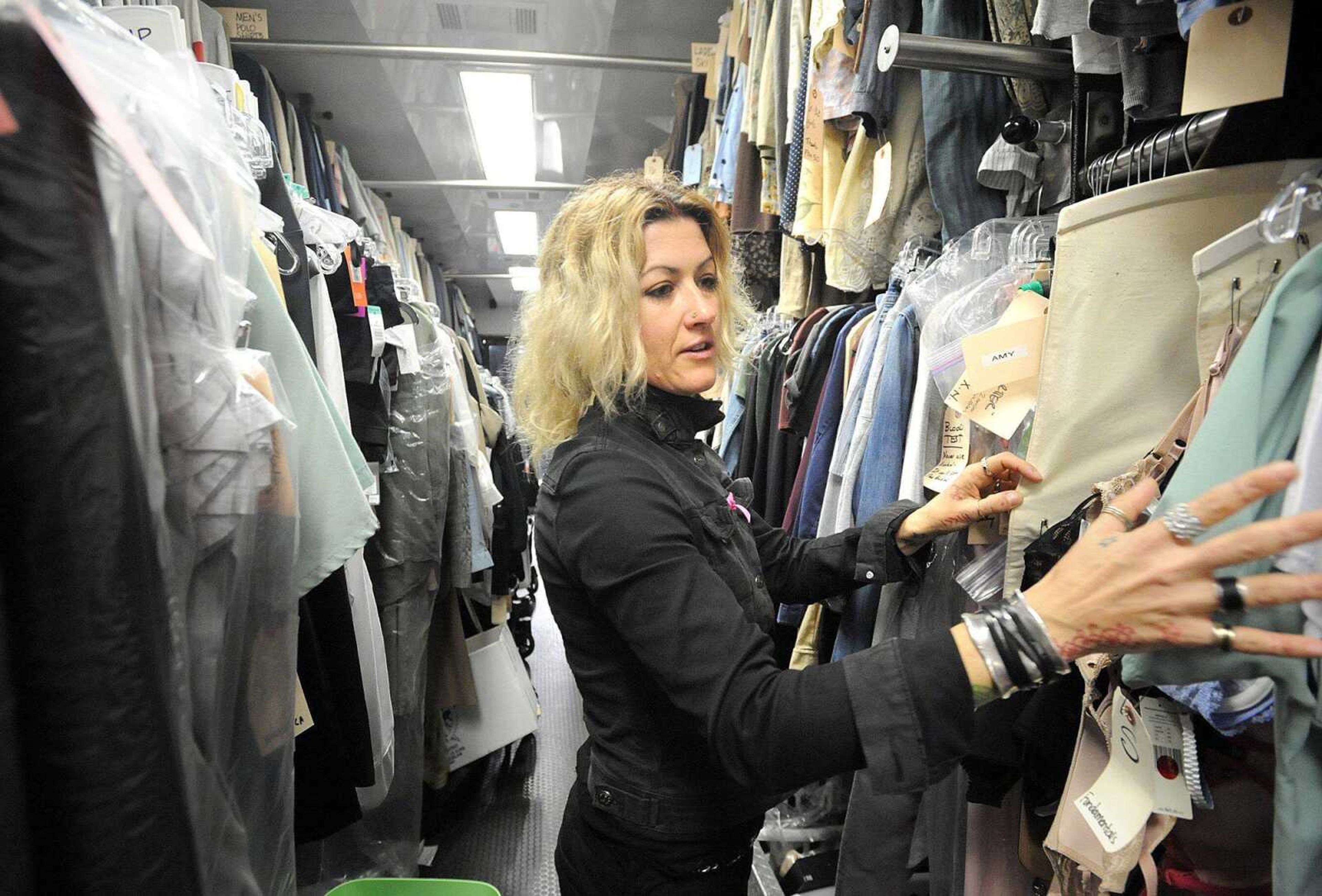 Trish Summerville, costume designer for the film &#8220;Gone Girl&#8221;, goes through the wardrobe selections for the film inside the wardrobe trailer. (LAURA SIMON ~ lsimon@semissourian.com)