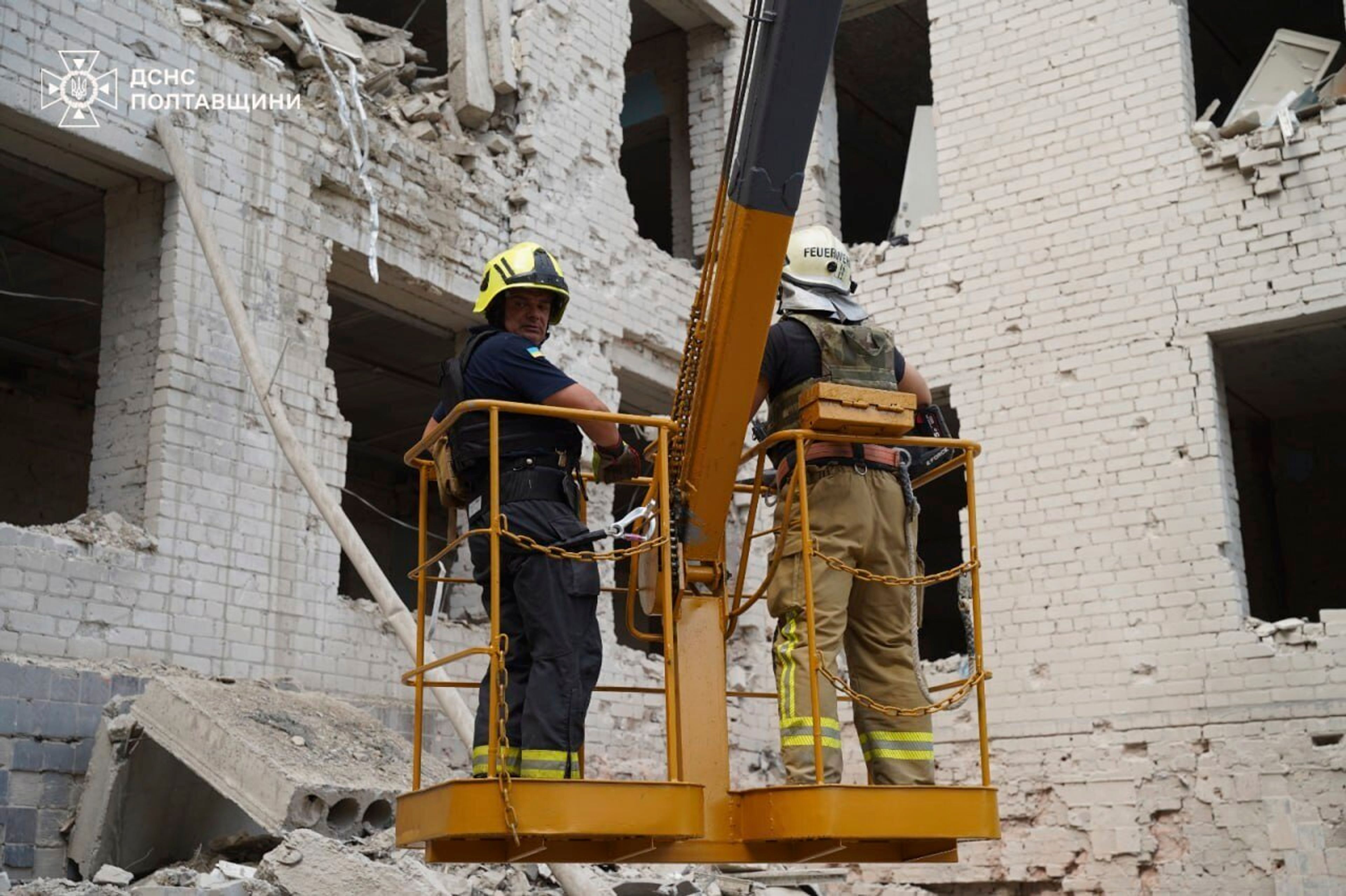 In this photo provided by the State Emergency Service of Ukraine on September 4, 2024, Rescuers work at a site of military university hit by a Russian strike in Poltava, Ukraine. (State Emergency Service of Ukraine via AP)