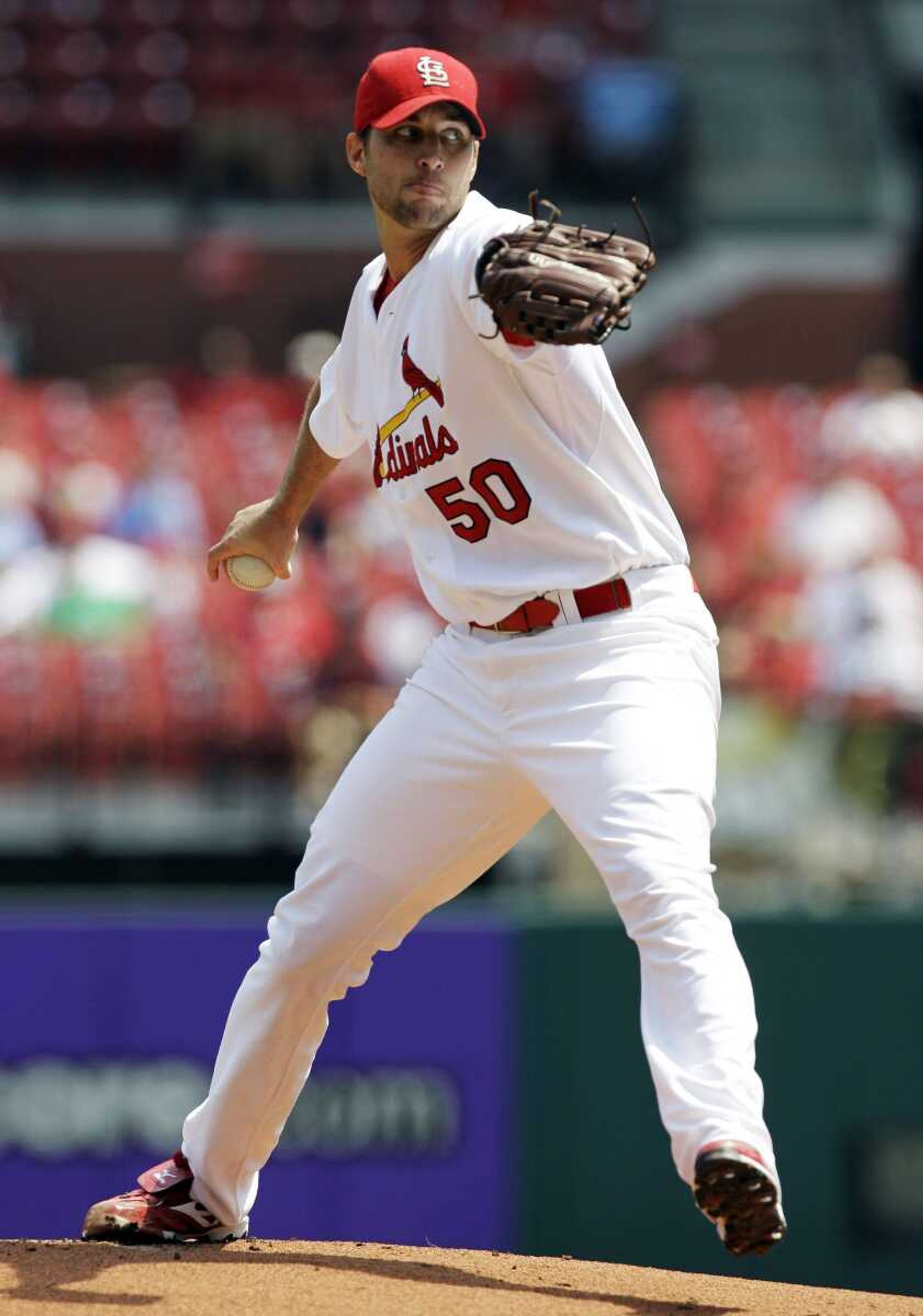 Cardinals starting pitcher Adam Wainwright throws during the first inning Wednesday.