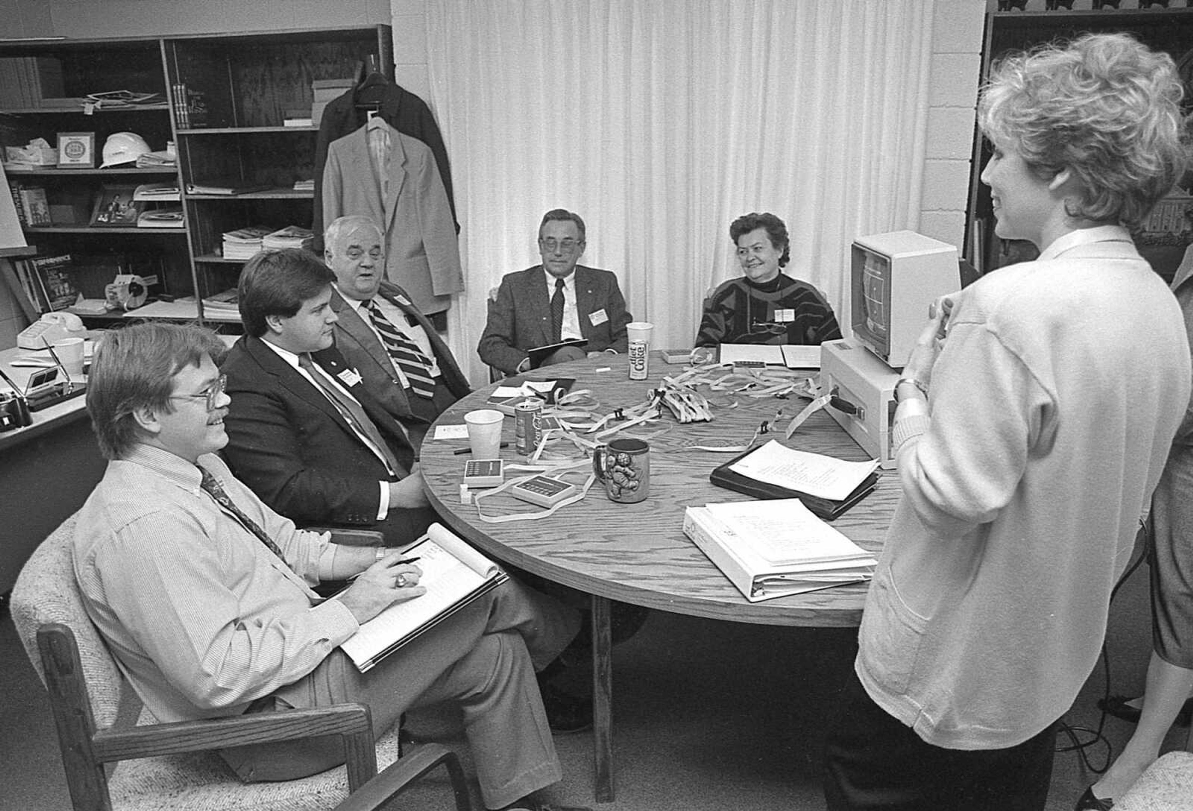 Published Feb. 11, 1987.
Members of a committee which chose the name, Show Me Center, for the multipurpose building discussed some ideas with Miranda Moss, standing, representative of the marketing-image firm of Seitz, Yamamoto and Moss, Inc., of Minneapolis, Minnesota. Seated, from left, were David Ross, building director, and committee members: David Barklage and Peter Hilty, city councilmen; and Pat Tlapek and Anne Bradshaw, Southeast Missouri State University Board of Regents members. (Fred Lynch ~ Southeast Missourian archive)