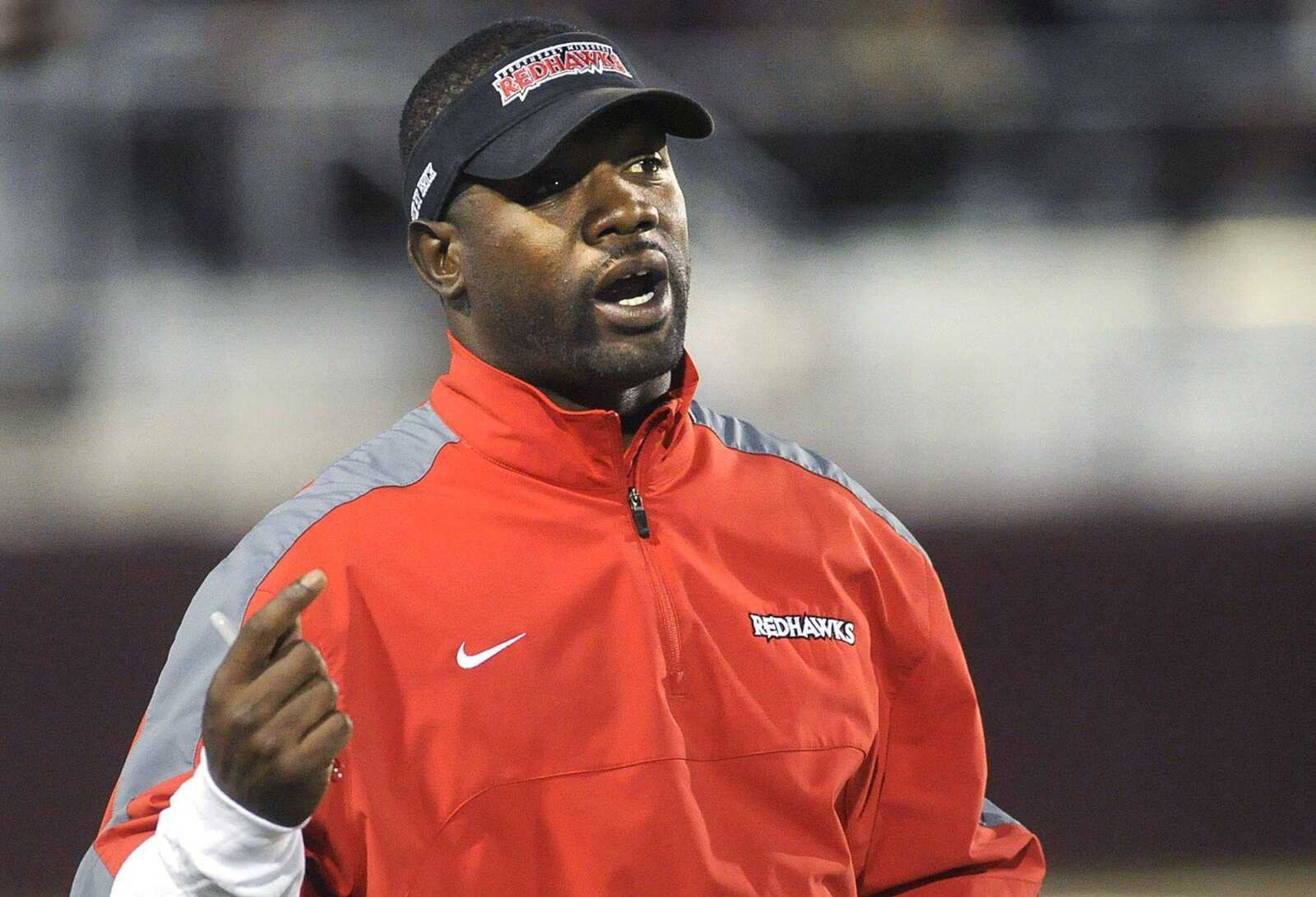 Willie Ponder coaches from the sidelines during at game at Southern Illinois earlier this season. He returned to Southeast in February to finish his degree and serve as an undergraduate assistant for the Redhawks. (Fred Lynch)