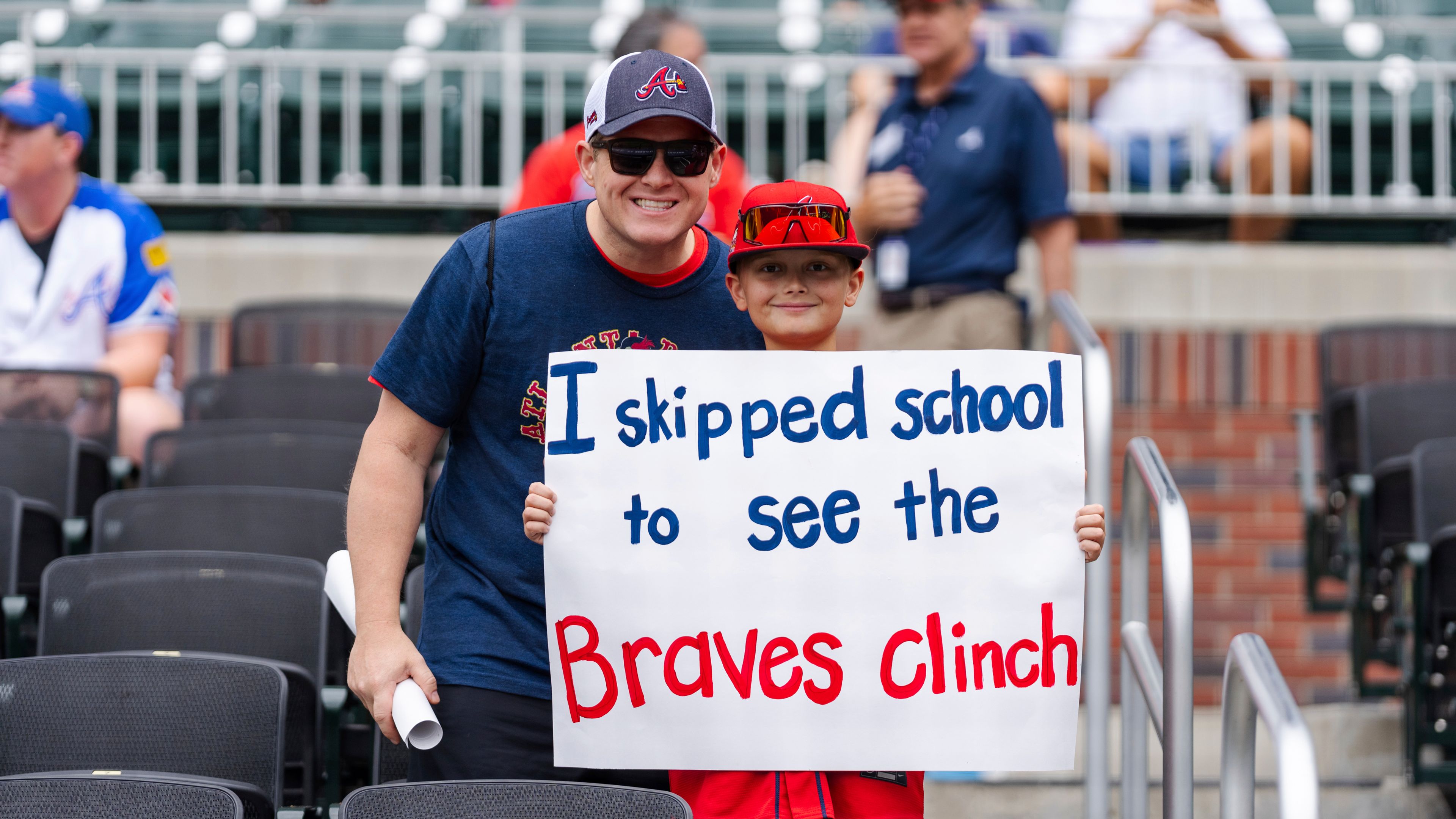 Atlanta Braves fans await for the start of a baseball game against the New York Mets, Monday, Sept. 30, 2024, in Atlanta. (AP Photo/Jason Allen)