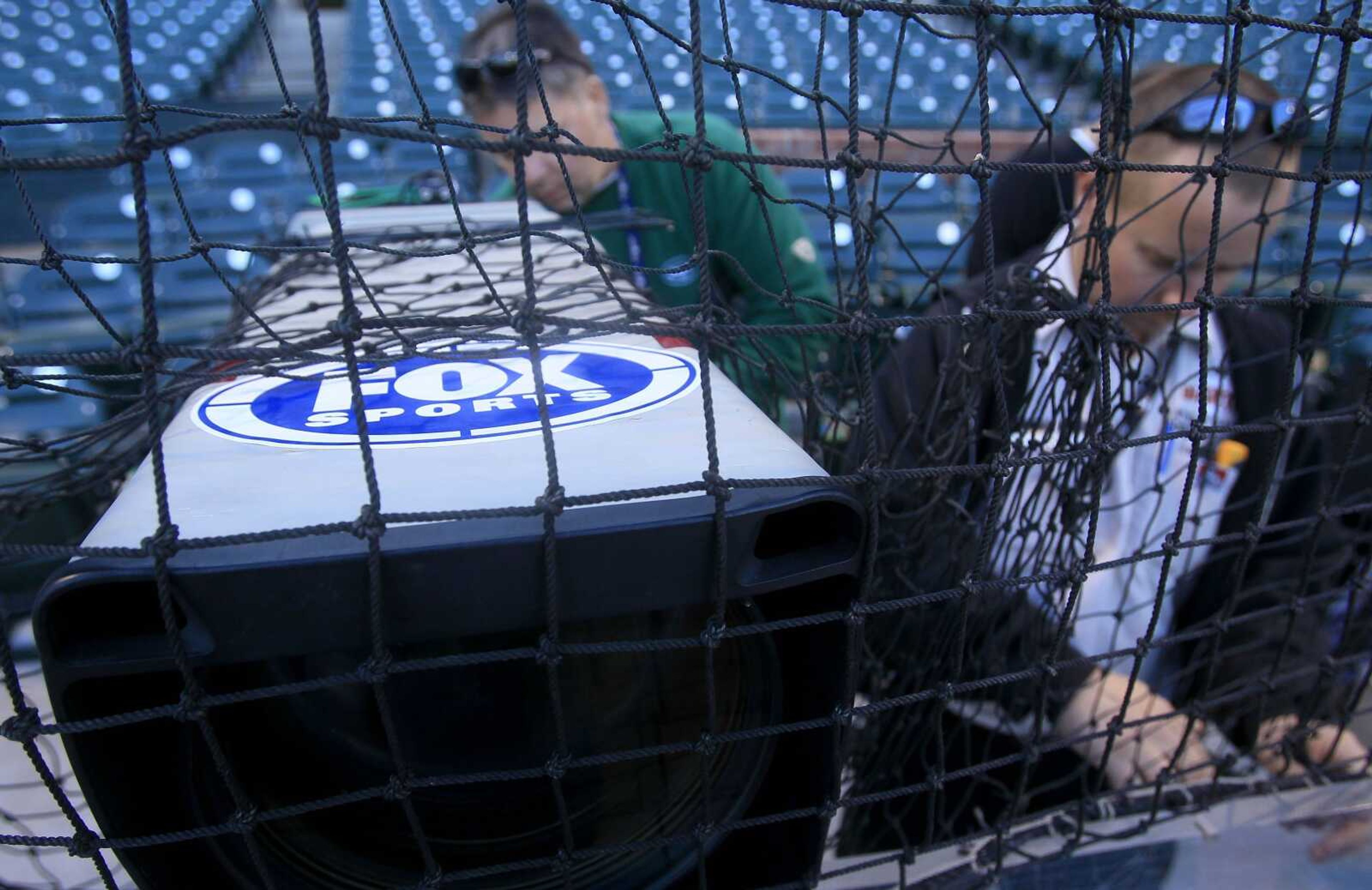 A Fox Sports television camera is adjusted Oct. 18 in San Francisco. Broadcasters blocked access to their online programming this month. (Jeff Chiu ~ Associated Press)