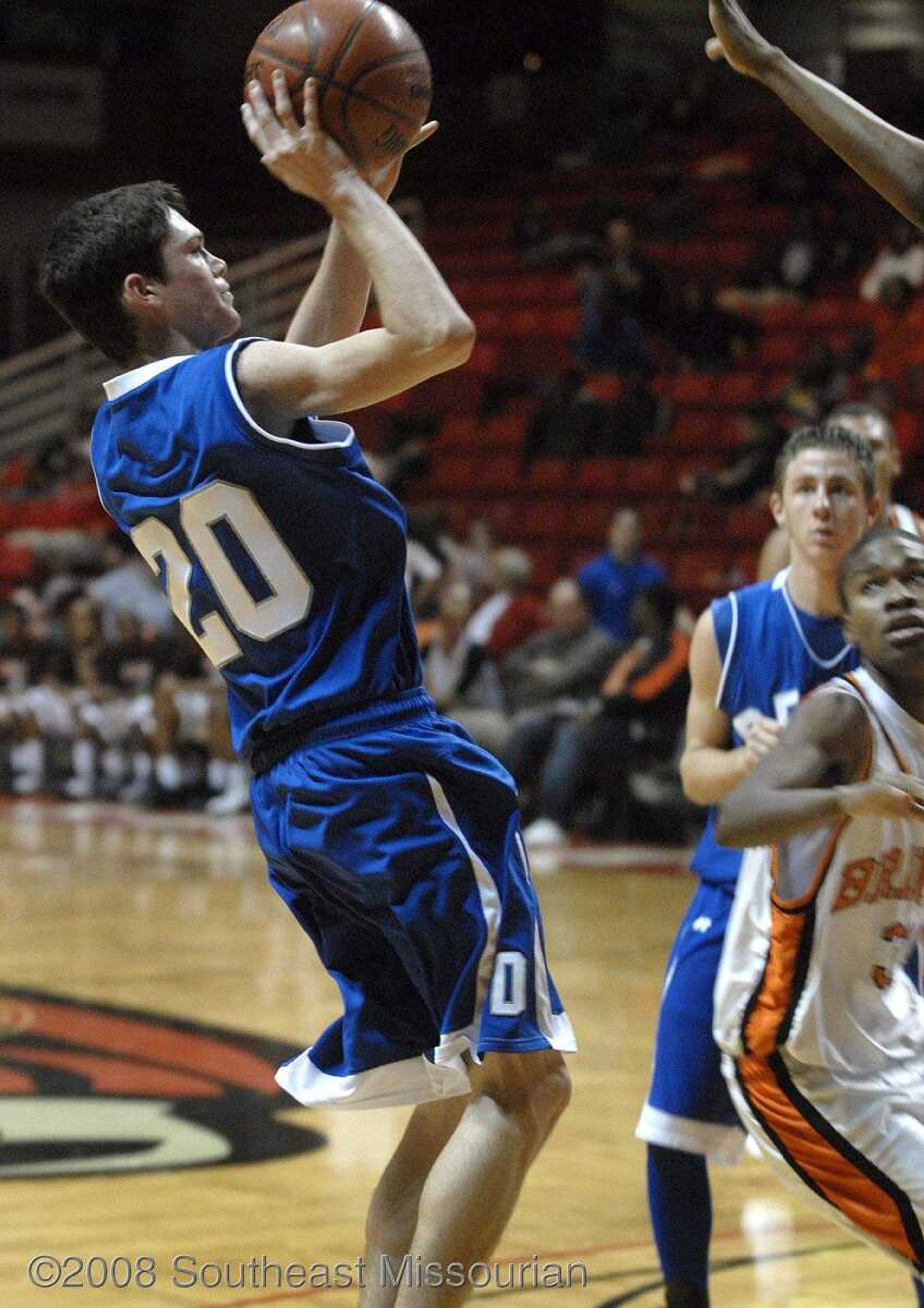 FRED LYNCH ~ flynch@semissourian.com
Delta's Zach Reigert shoots against Scott County Central during the third quarter in the Southeast Missourian Christmas Tournament Friday at the Show Me Center.