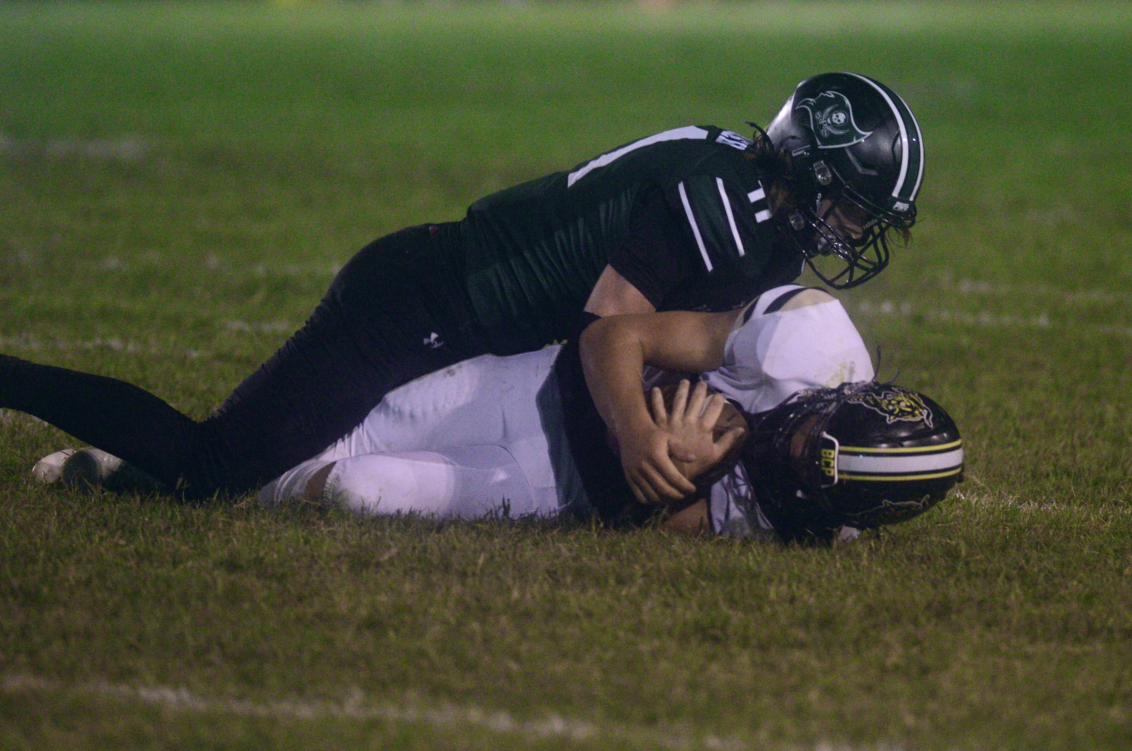 Perryville defensive end Dominic Seiler tackles a Fredericktown ball carrier on Thursday, Aug. 29, in Perryville, Mo.