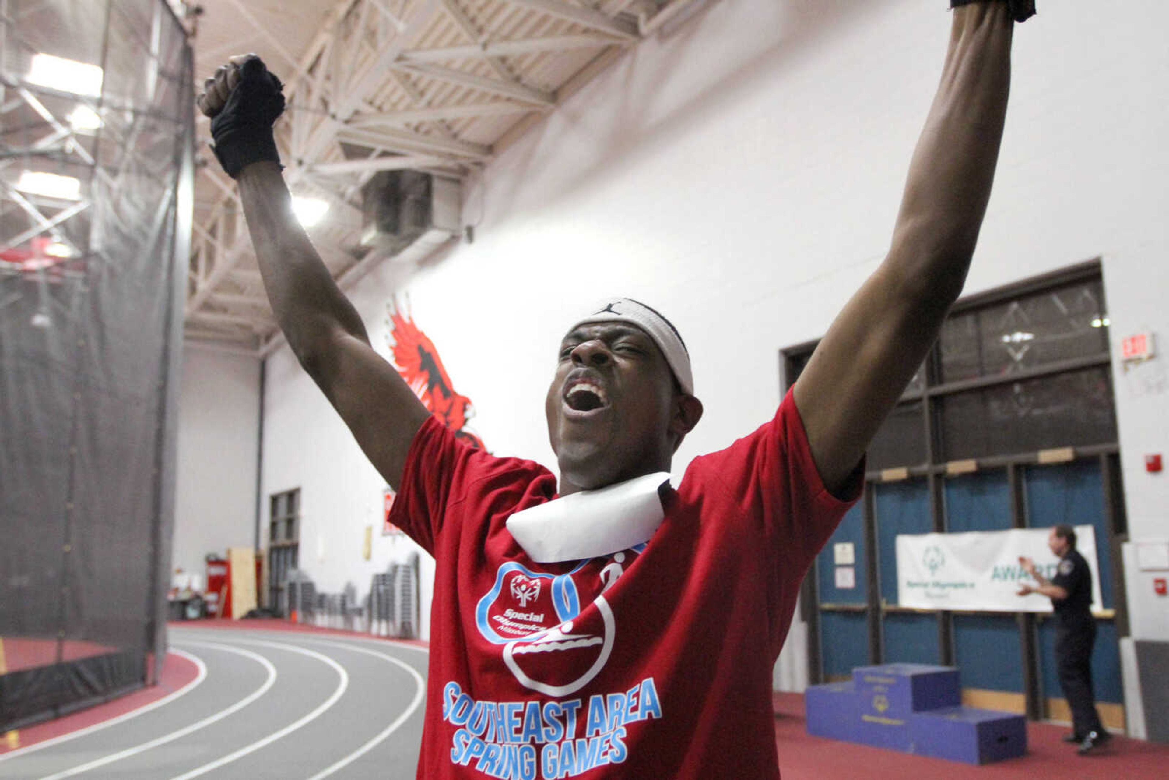 GLENN LANDBERG ~ glandberg@semissourian.com

Derrick Liddell celebrates after his first place finish in the 400-meter race during the Missouri Special Olympics Southeast Area Spring Games Saturday, April 11, 2015 at the Student Recreation Center of Southeast Missouri State University.