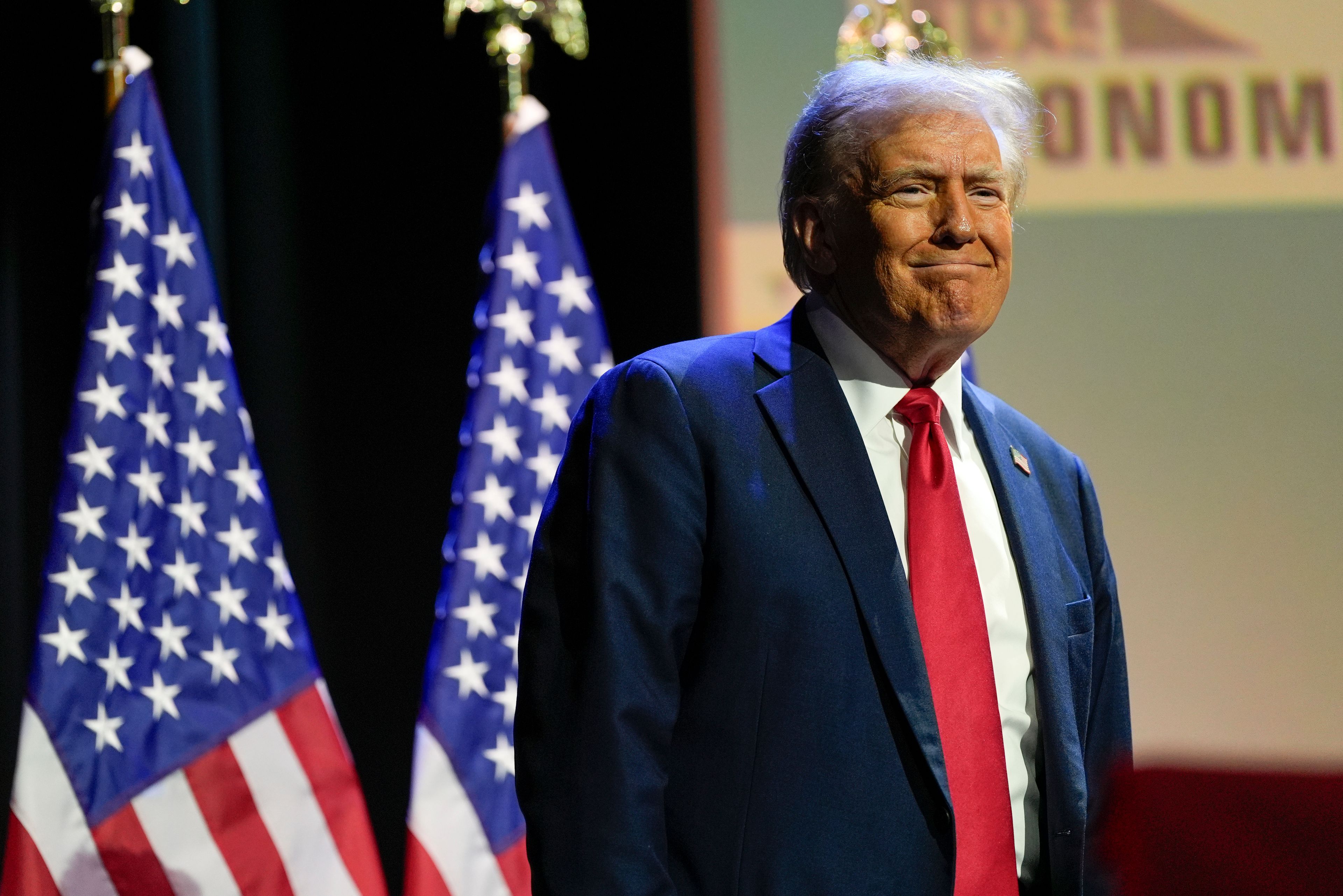 Republican presidential nominee former President Donald Trump arrives to speak at a meeting of the Detroit Economic Club, Thursday, Oct. 10, 2024, in Detroit. (AP Photo/Julia Demaree Nikhinson)