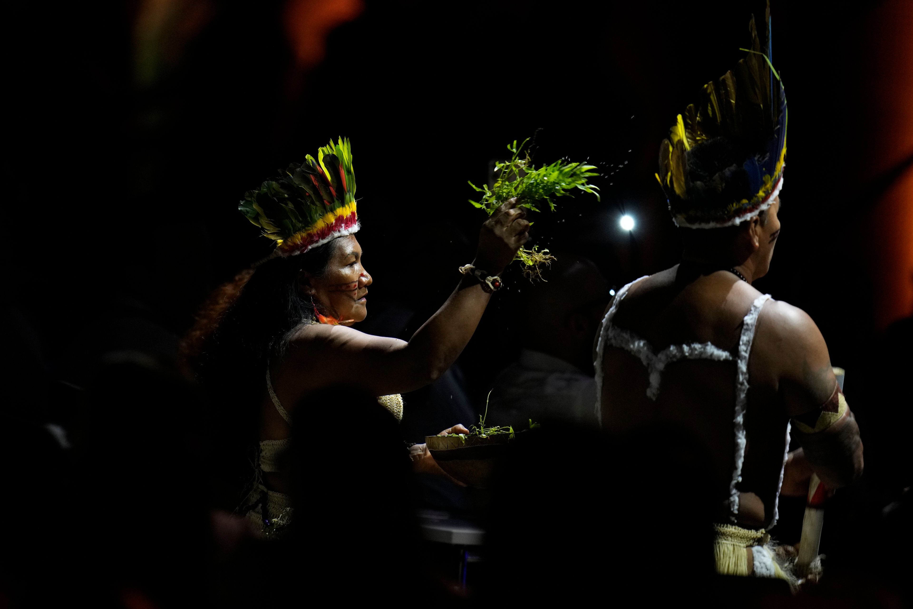 Wayuu Indigenous Colombians perform during the opening ceremony of COP16, a United Nations' biodiversity conference, in Cali, Colombia, Sunday, Oct. 20, 2024. (AP Photo/Fernando Vergara)