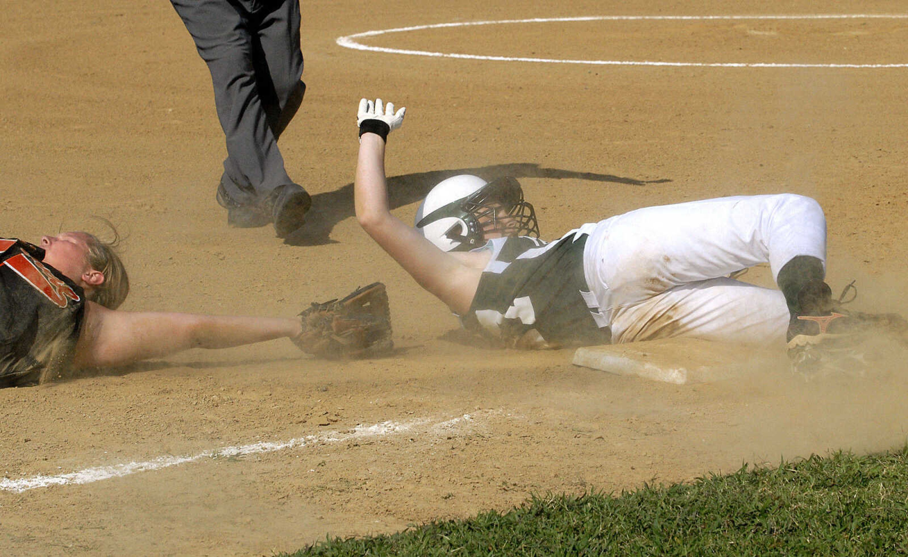 FRED LYNCH ~ flynch@semissourian.com
Perryville baserunner Lexi Rollet reaches third base safely on a triple before Central third baseman Tori Ourth could tag her in the second inning Monday at Central.