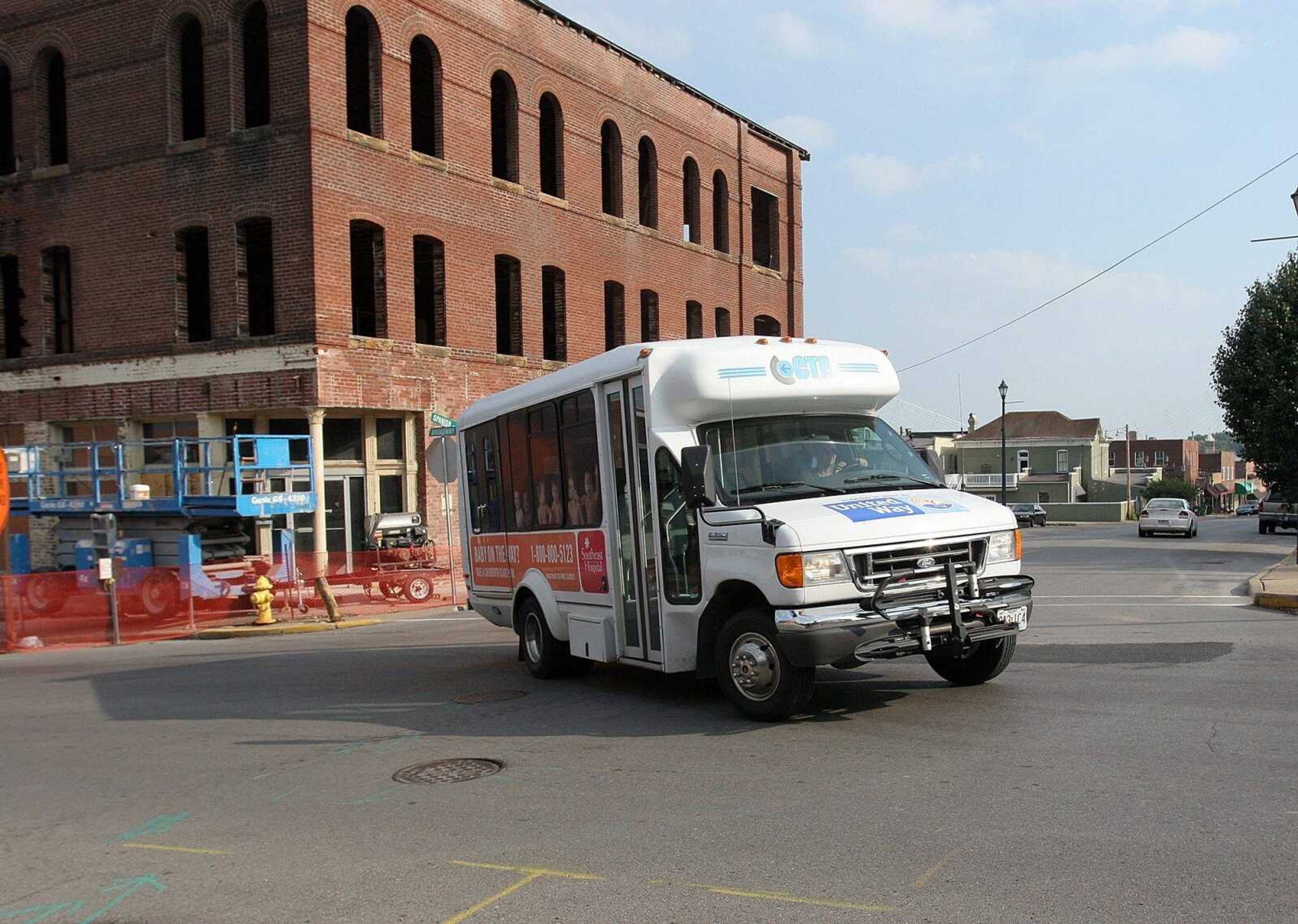 A Cape Girardeau County Transit Authority Bus turns left onto Broadway Avenue from Spanish Street Aug. 7, 2009.