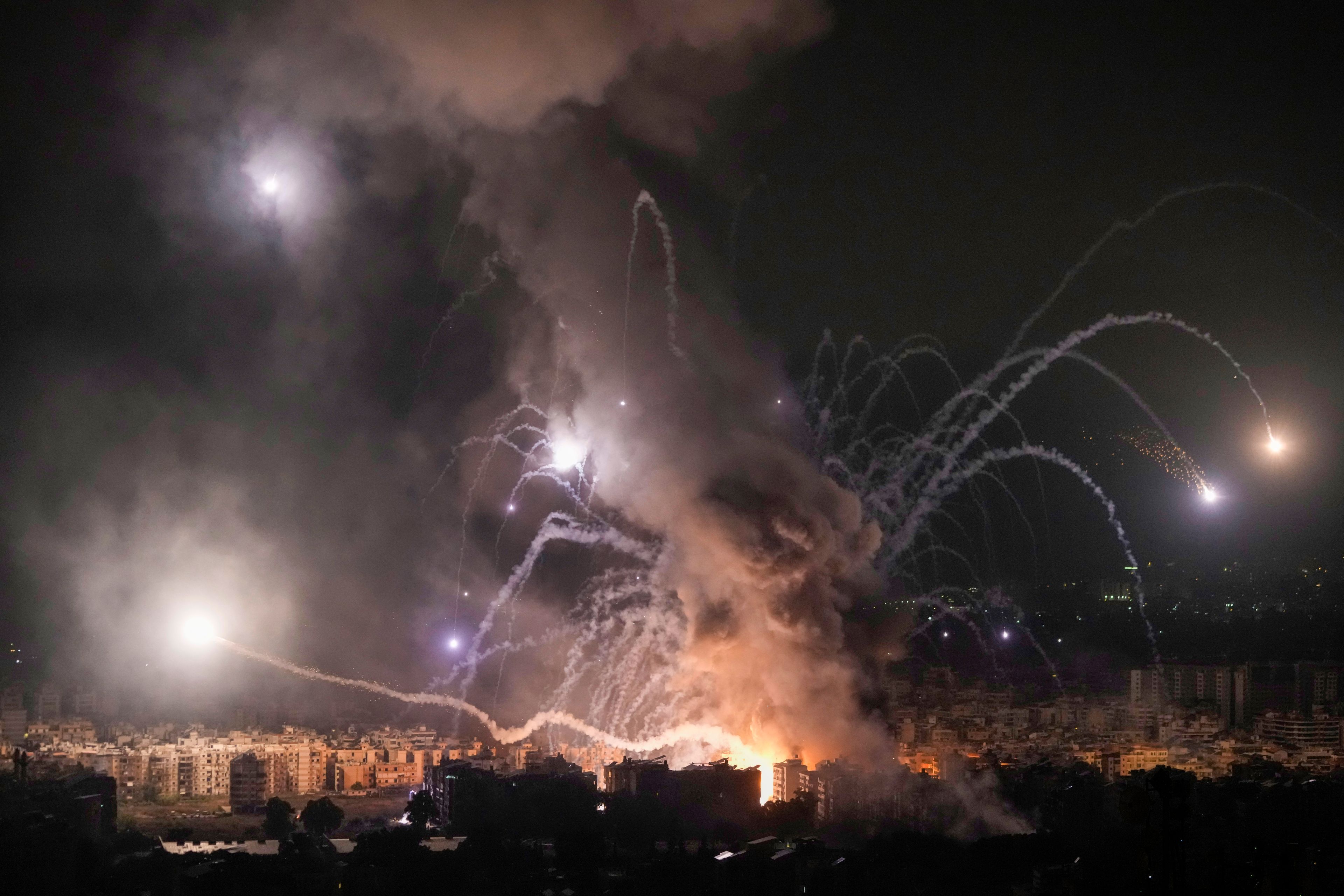 CORRECTS DATE TO MONDAY, OCT. 7, FROM SUNDAY, OCT. 6 - Flames and smoke rise from an Israeli airstrike in Dahiyeh, Beirut, Lebanon, Monday, Oct. 7, 2024. (AP Photo/Bilal Hussein)