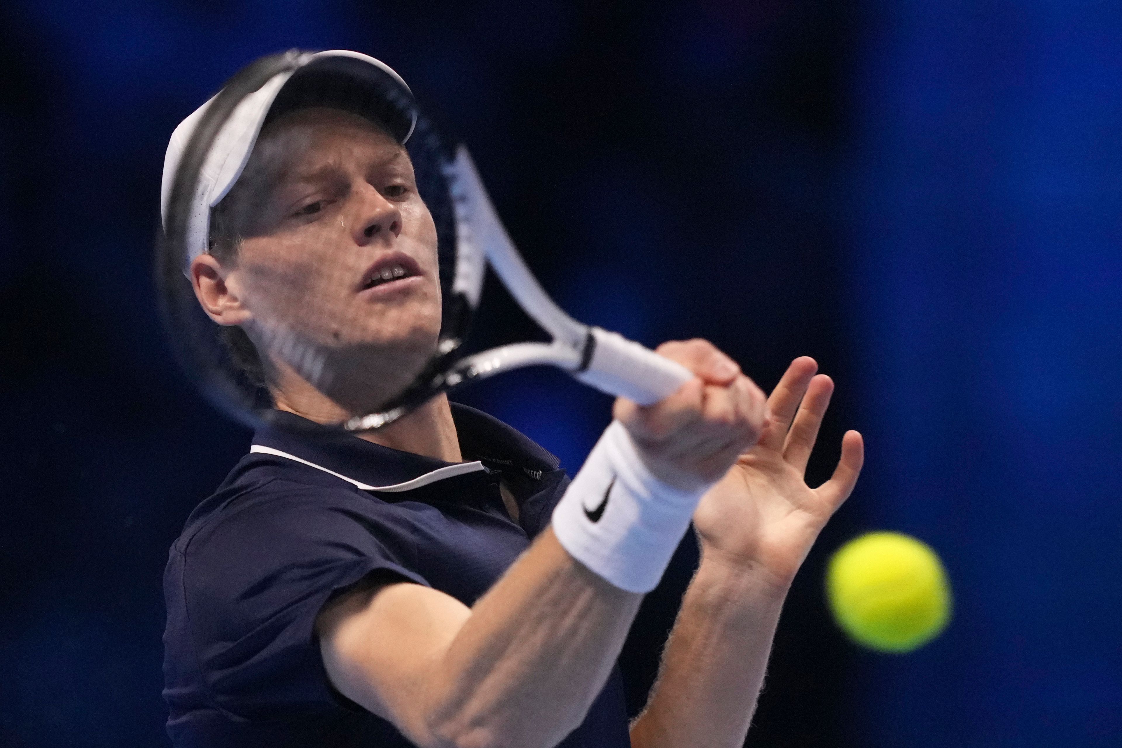 Italy's Jannik Sinner returns the ball to Russia's Daniil Medvedev during their singles tennis match of the ATP World Tour Finals at the Inalpi Arena, in Turin, Italy, Thursday, Nov. 14, 2024. (AP Photo/Antonio Calanni)