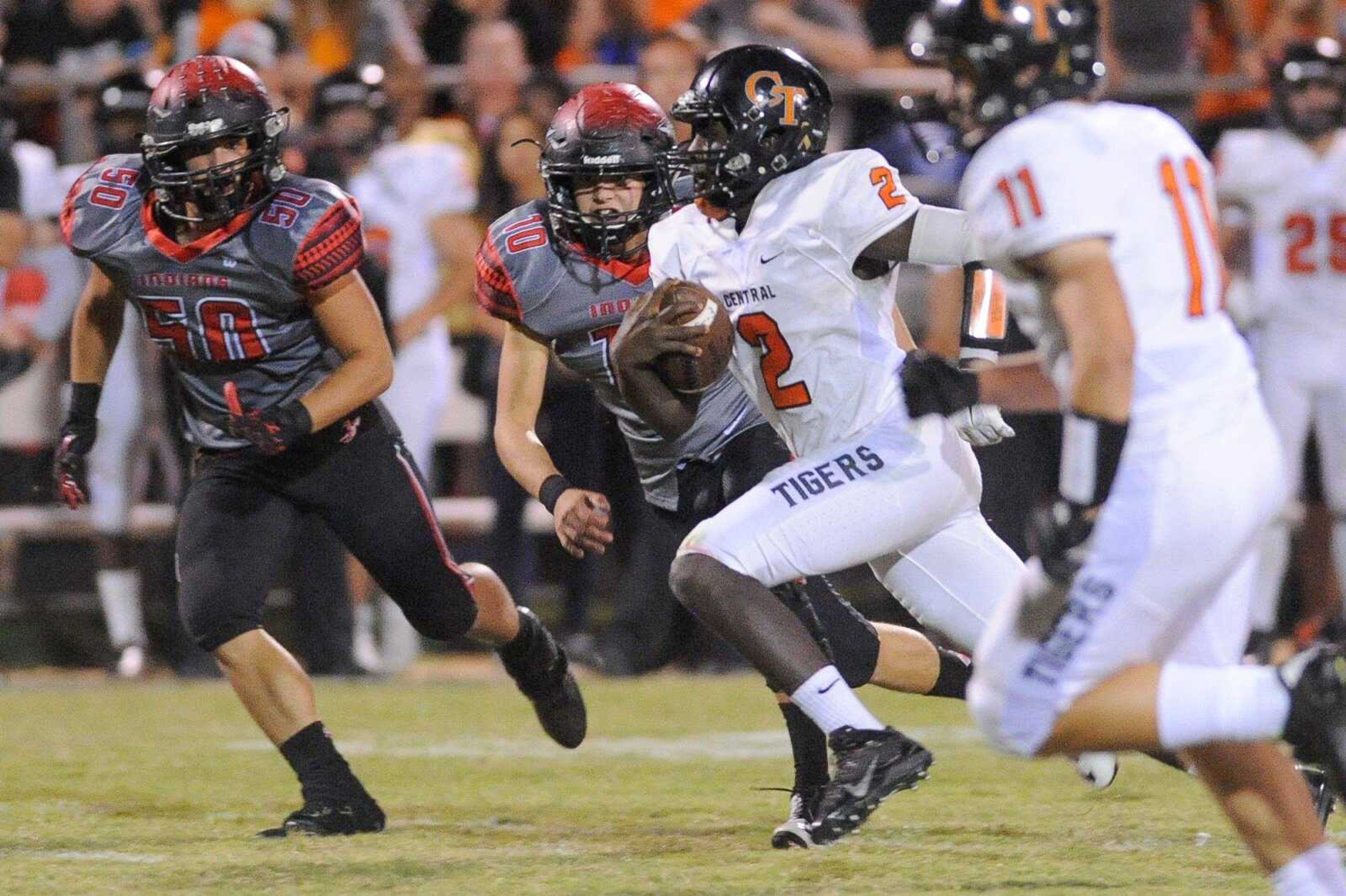 Cape Central quarterback Kway'Chon Chisom picks up yardage against Jackson during their game this past season. Chisom, a junior, was among six Tigers to receive all-state honors from the Missouri Football Coaches Association. (Glenn Landberg)