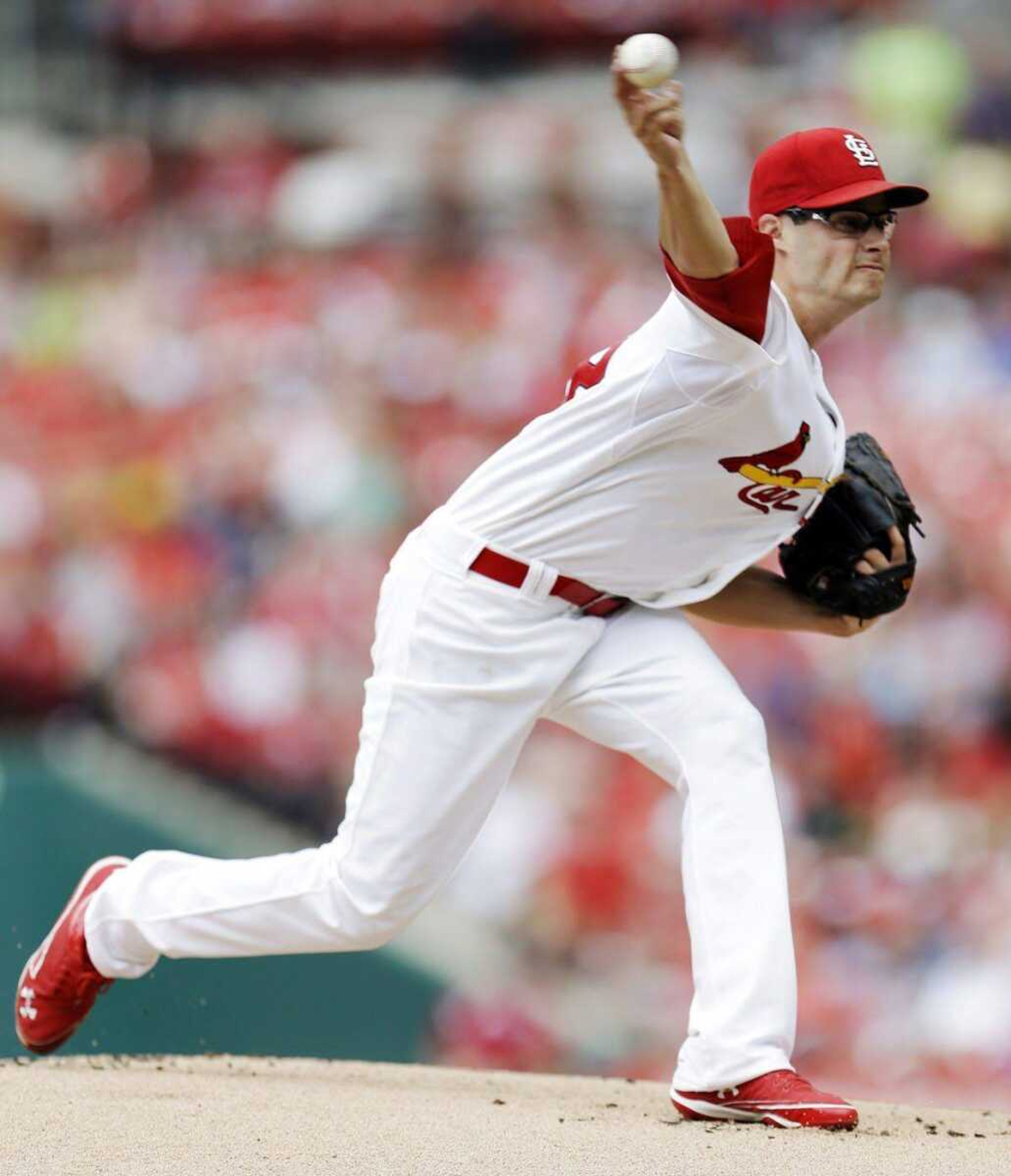 Cardinals starting pitcher Joe Kelly throws against the Mets during the first inning Monday in St. Louis. (Jeff Roberson ~ Associated Press)