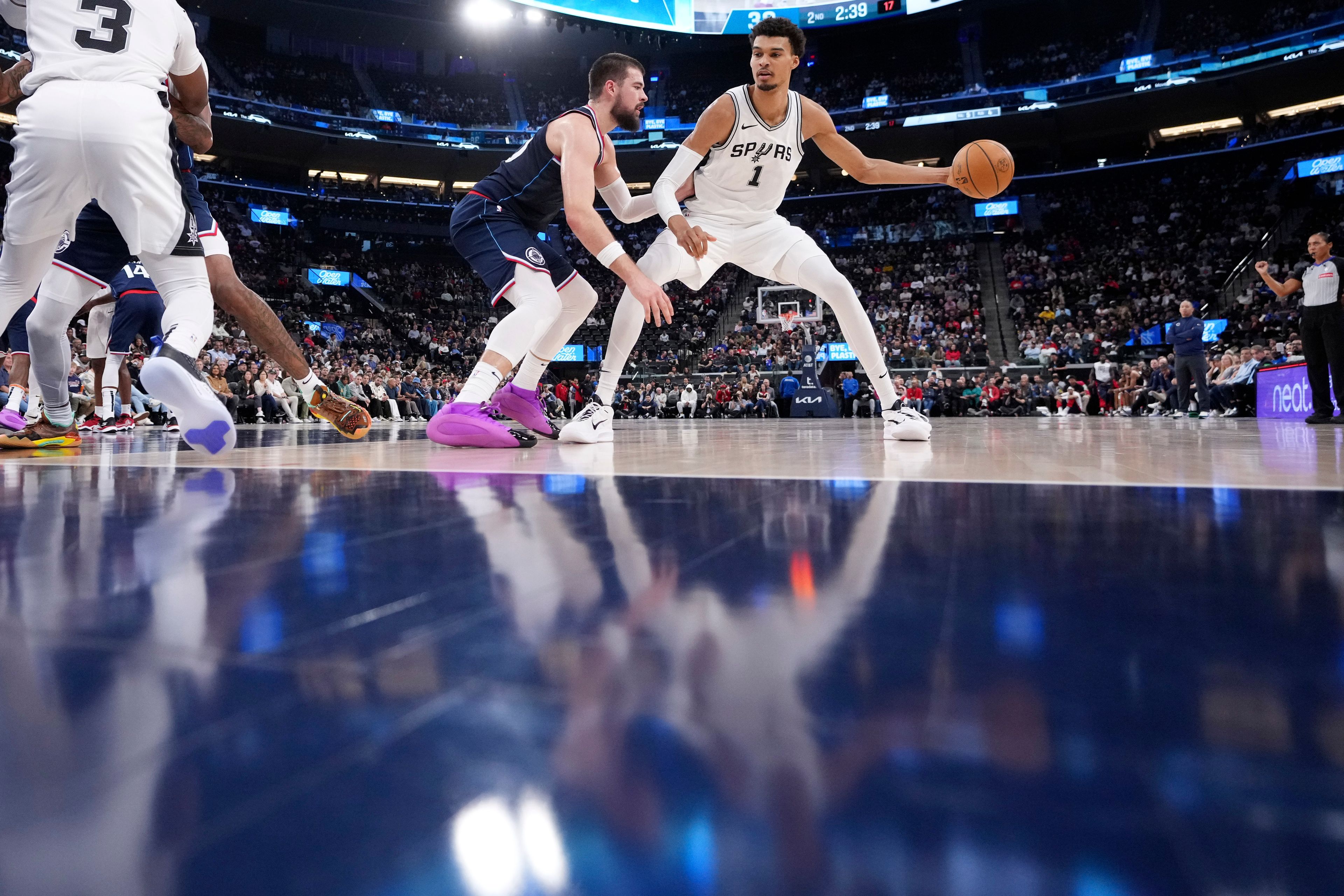 San Antonio Spurs center Victor Wembanyama, right, drives against Los Angeles Clippers center Ivica Zubac during the first half of an NBA basketball game, Monday, Nov. 4, 2024, in Inglewood, Calif. (AP Photo/Mark J. Terrill)