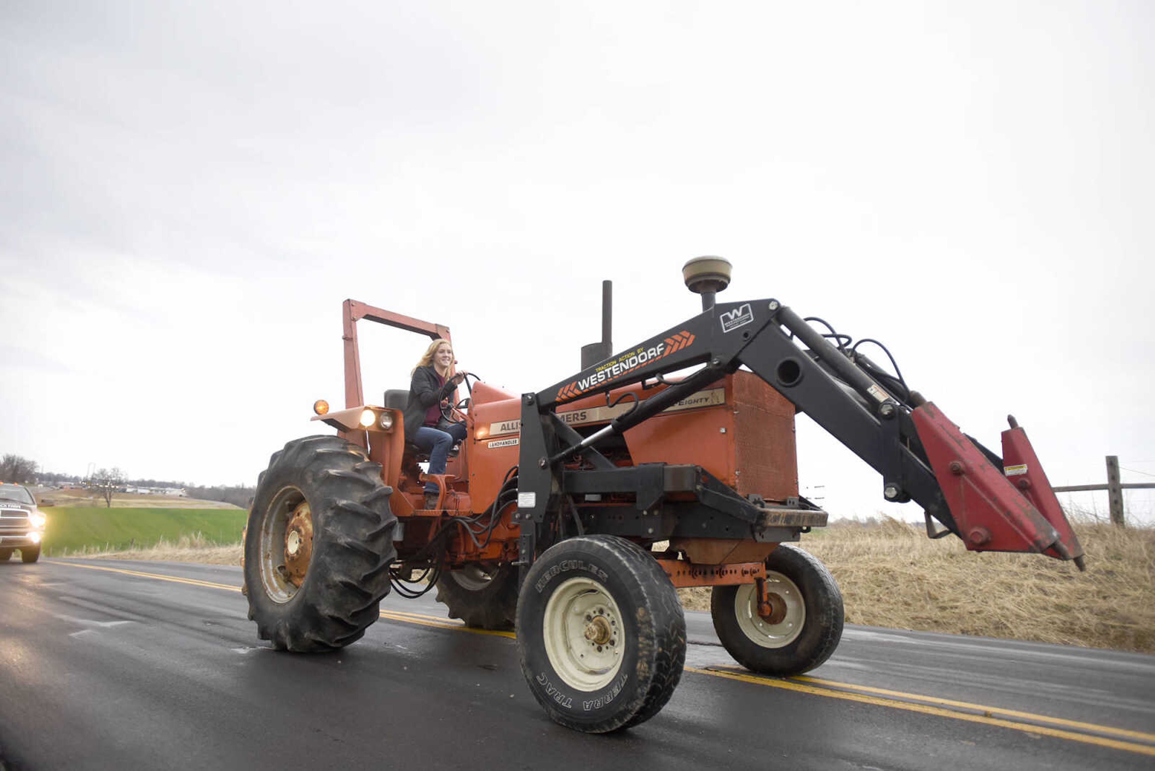 Saxony Lutheran High School FFA students take to the road on their tractors during drive your tractor to school day on Tuesday morning, Feb. 21, 2017. Students began their journey to school from Davis Farm Supply on Highway 61 in Jackson as part of FFA Week.